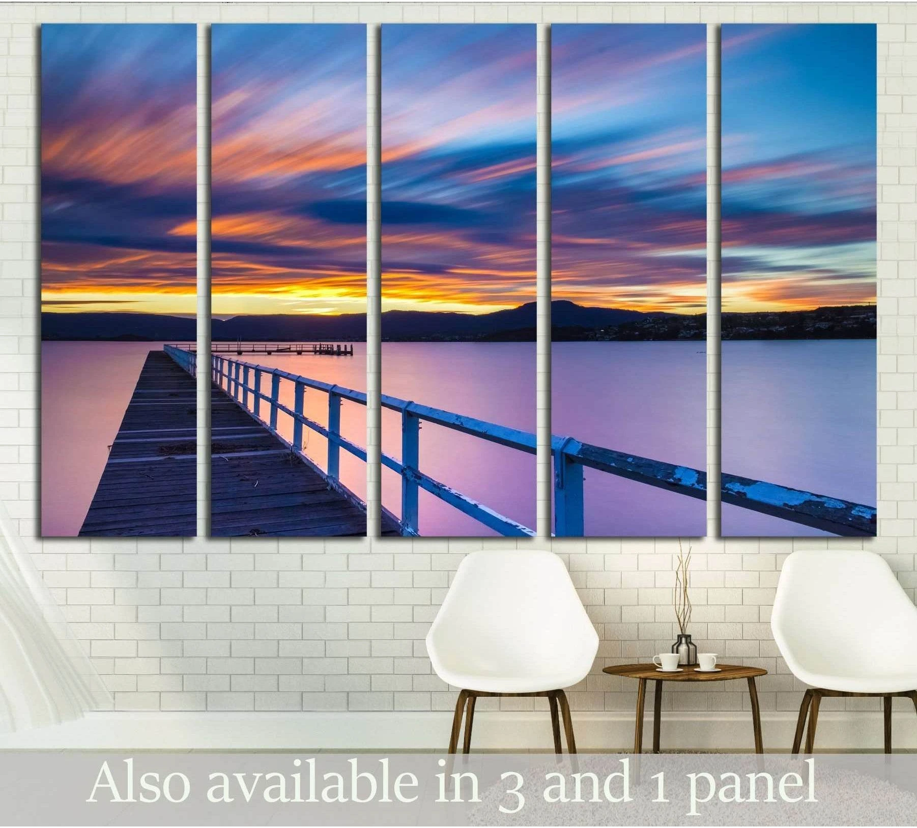 Jetty sunset canvas print with purple and blue sky displayed in a modern coastal living room