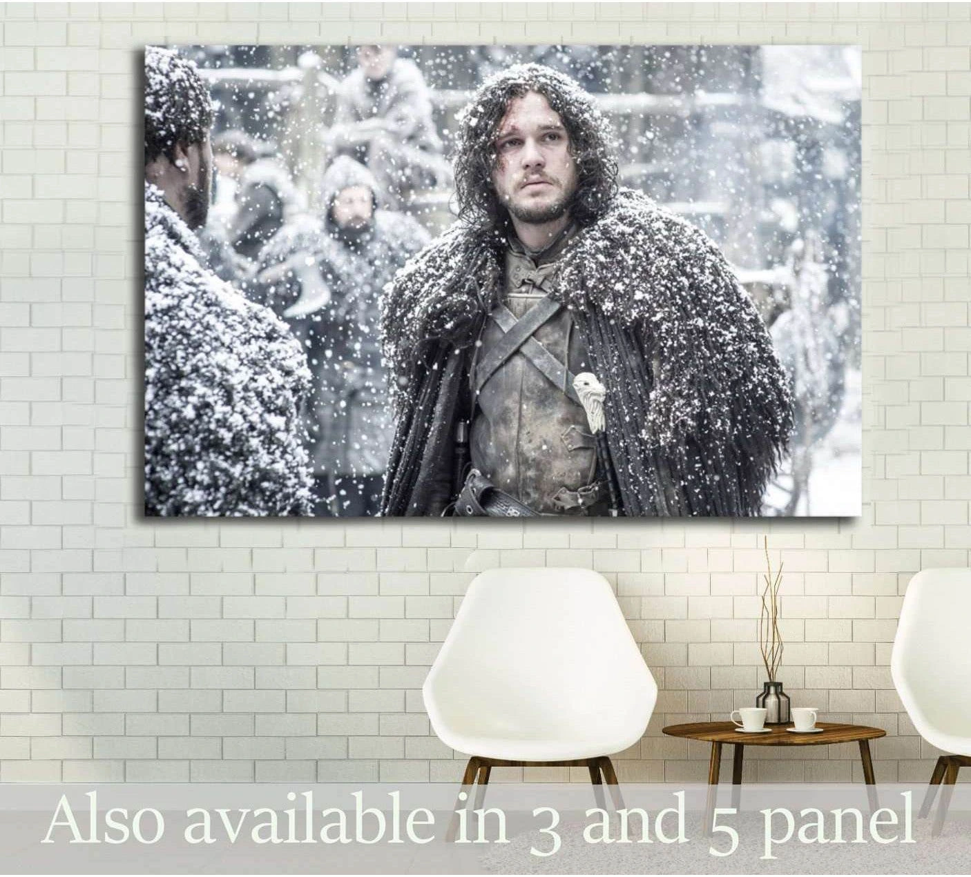 Jon Snow canvas print in falling snow, displayed above chairs in a modern waiting room