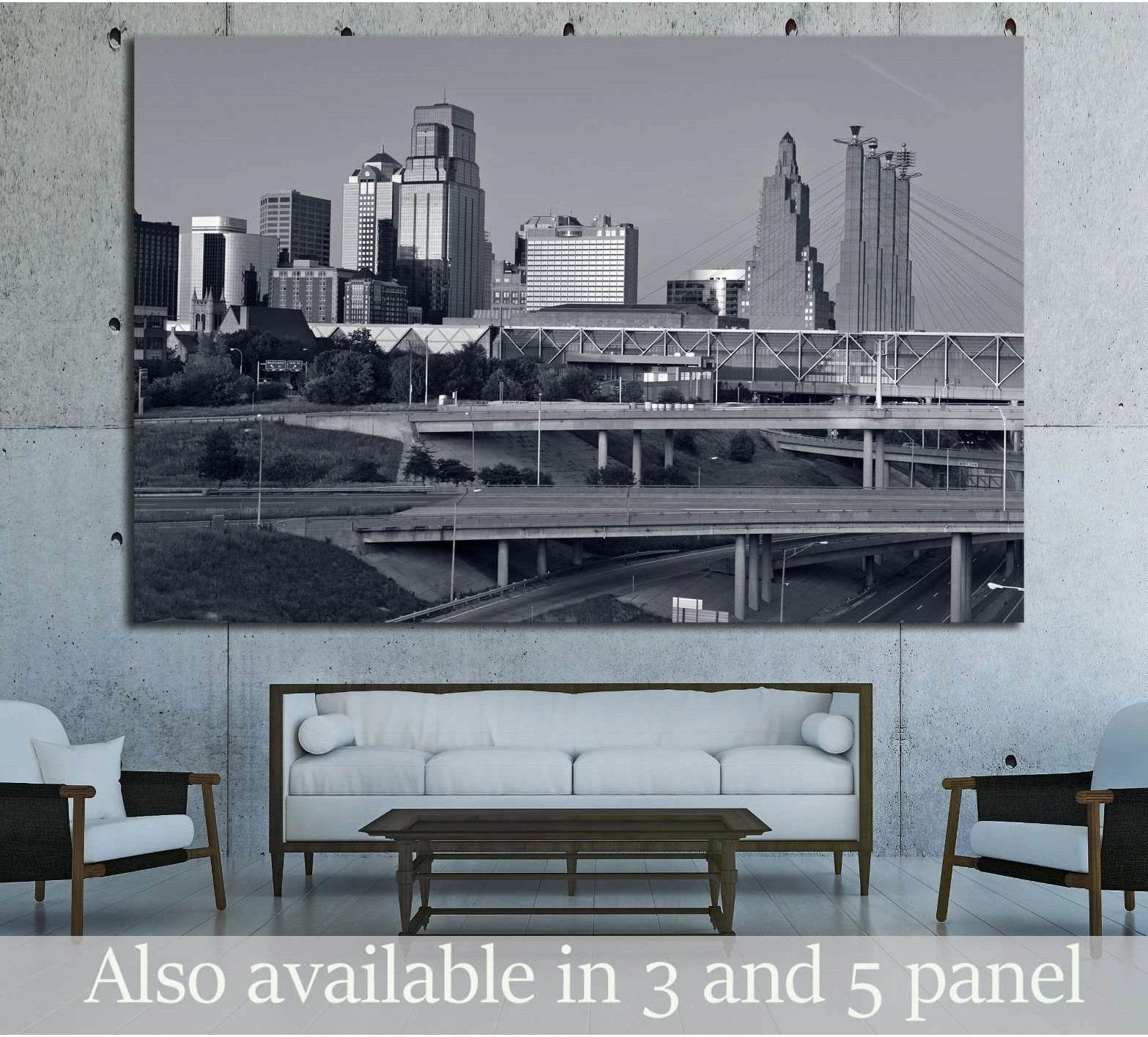 Black and white Kansas City skyline canvas print displayed above sofa in a modern living room