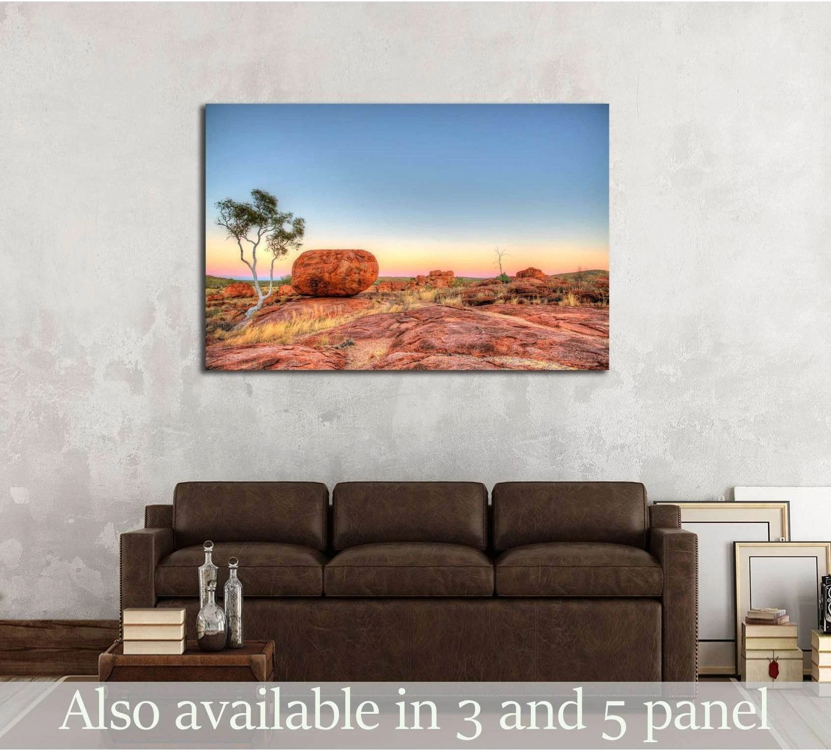 Devils Marbles canvas print with red rock outback landscape above sofa in a neutral living room