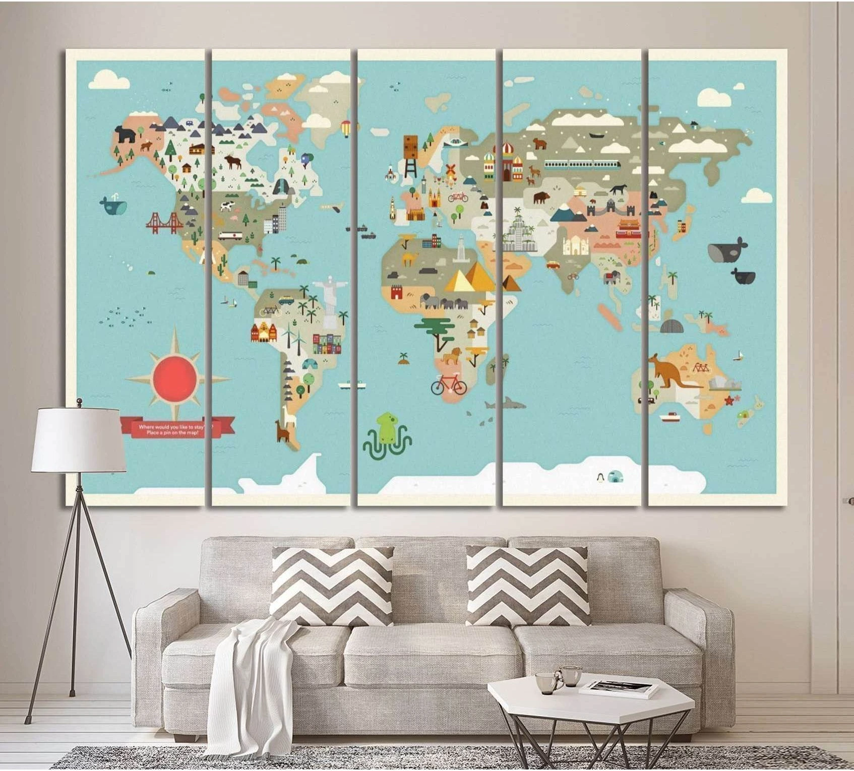 Pastel kids world map canvas print with animals and landmarks above sofa in a neutral room