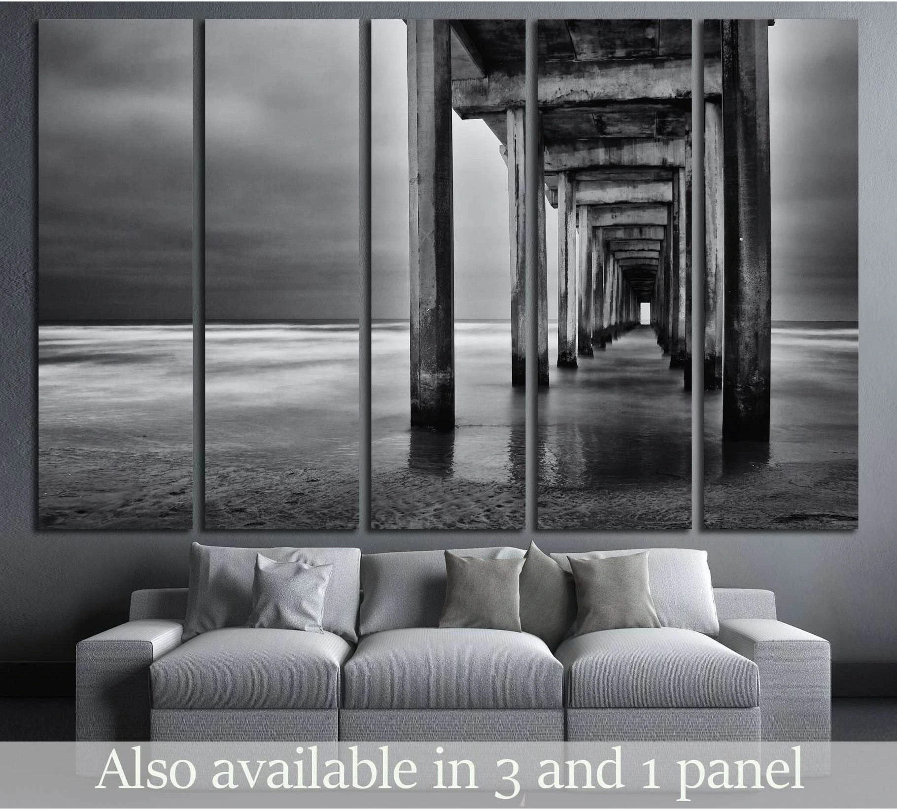 La Jolla beach, California, long exposure under the pylons, black and white image. showing sea water, shoreline and horizon depth.