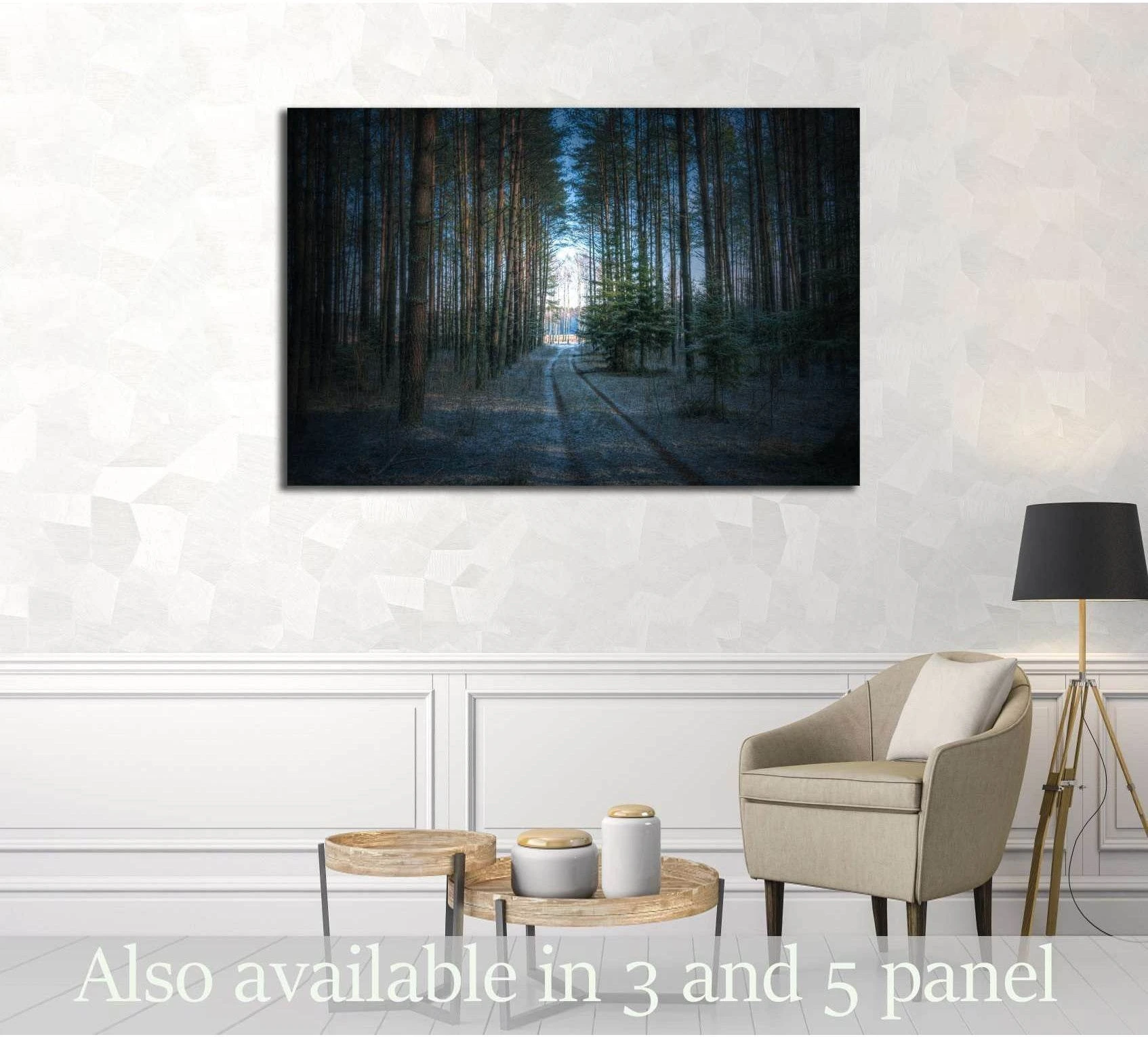 Winter forest road canvas print hanging above a chair in a neutral living room mockup