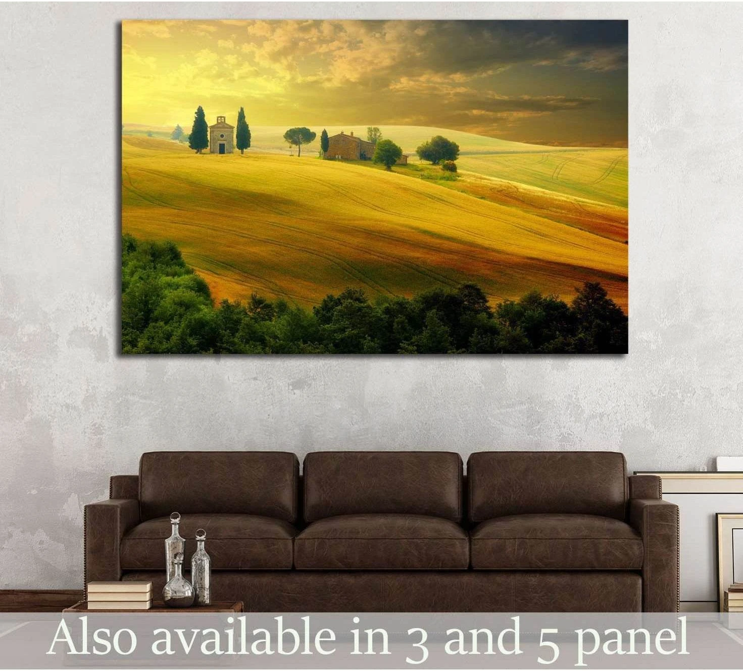 Golden Tuscany landscape canvas print with cypress trees, hung above sofa in a neutral living room