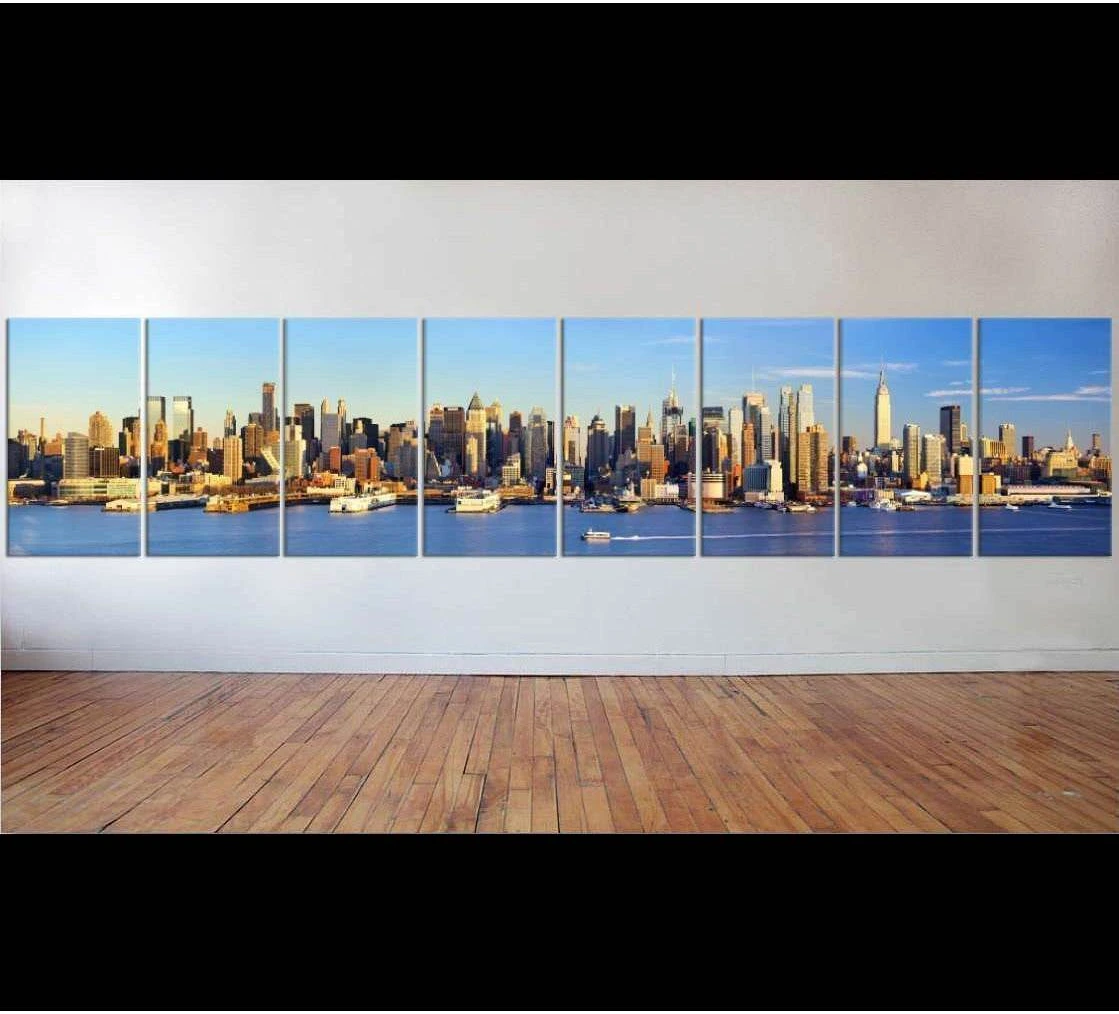 Panoramic Manhattan Midtown skyline canvas print with blue sky and river in a multi-panel wall display