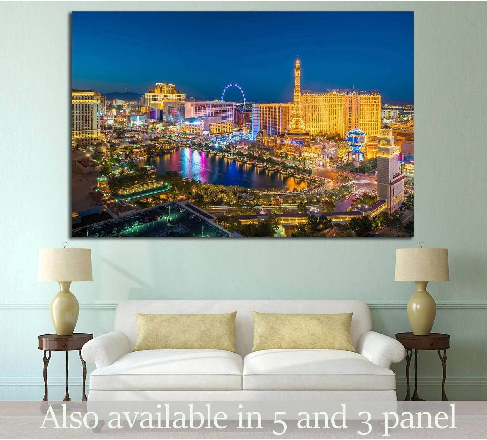 Las Vegas night skyline canvas print with Eiffel Tower replica above sofa in modern living room