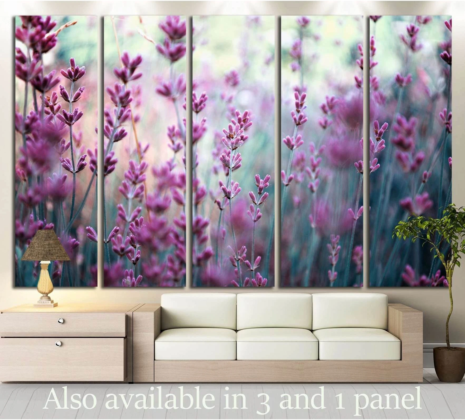 Lavender flowers canvas print in soft pink and teal tones displayed as a five-panel piece above a sofa