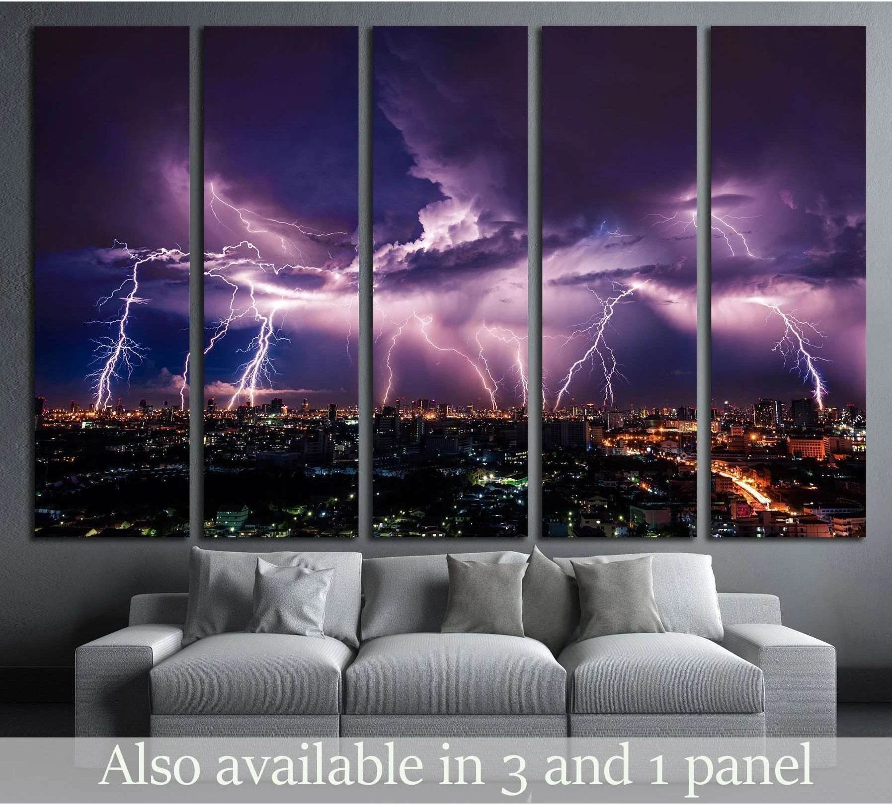 Purple lightning storm over city skyline multi-panel canvas print above sofa in modern living room