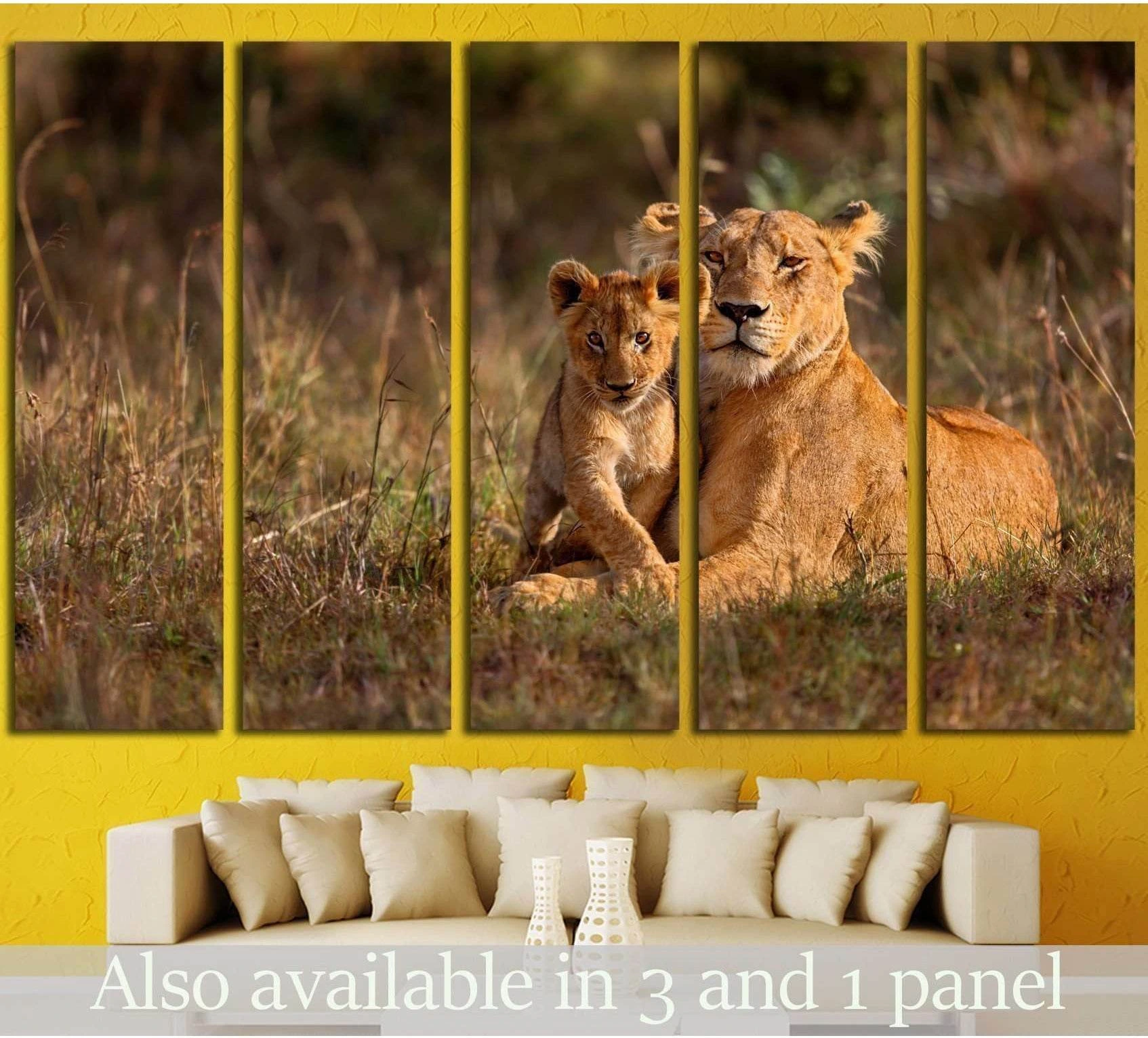 Lioness and cub canvas print in Masai Mara grassland, shown as multi-panel wall art above a sofa