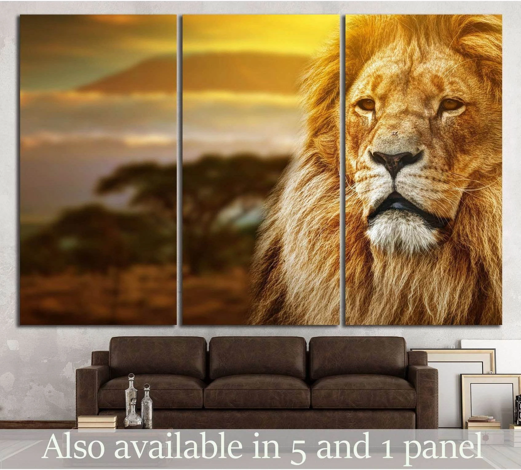 Triptych lion canvas print with golden mane and savanna sunset above a brown sofa