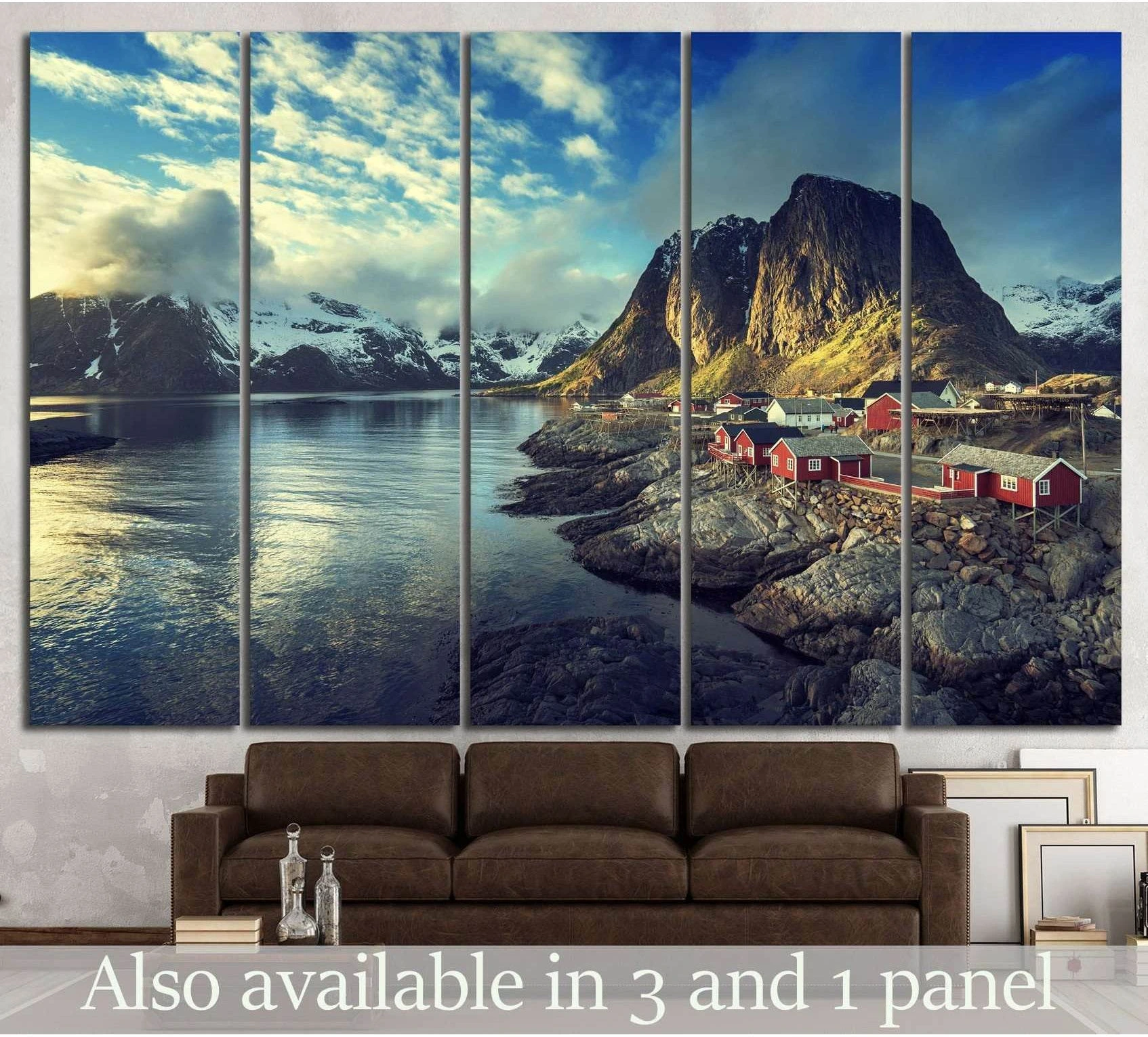 Lofoten Islands canvas print with red fishing cabins, fjord, and mountains above a sofa
