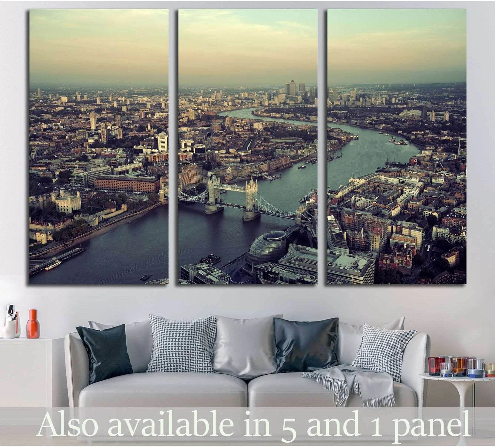 London Tower Bridge aerial canvas print hung above a sofa in a modern living room