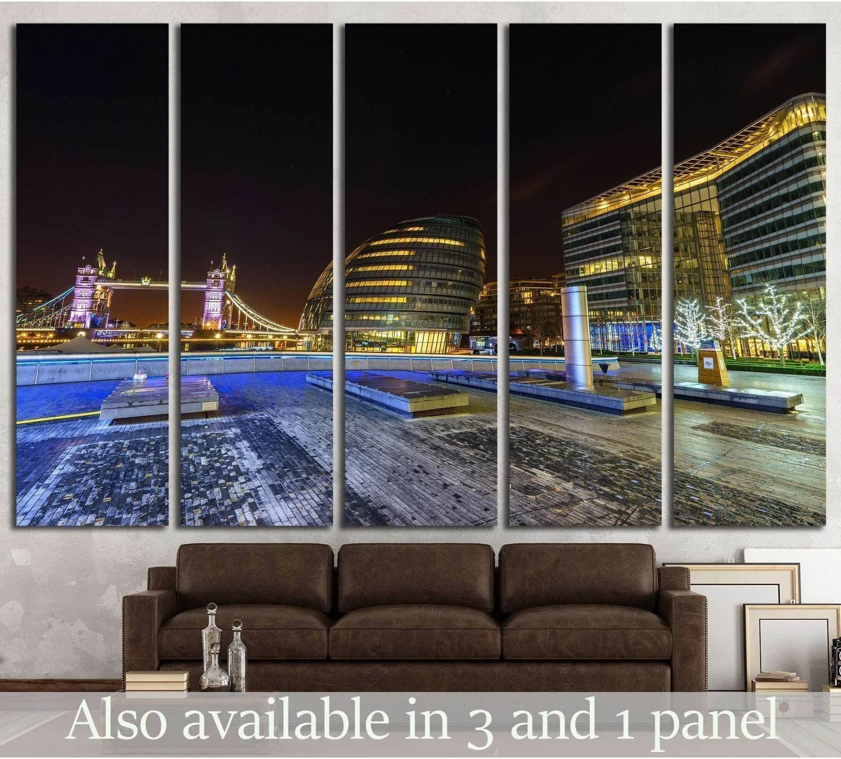 London Tower Bridge night canvas print with City Hall skyline above a sofa in a modern living room