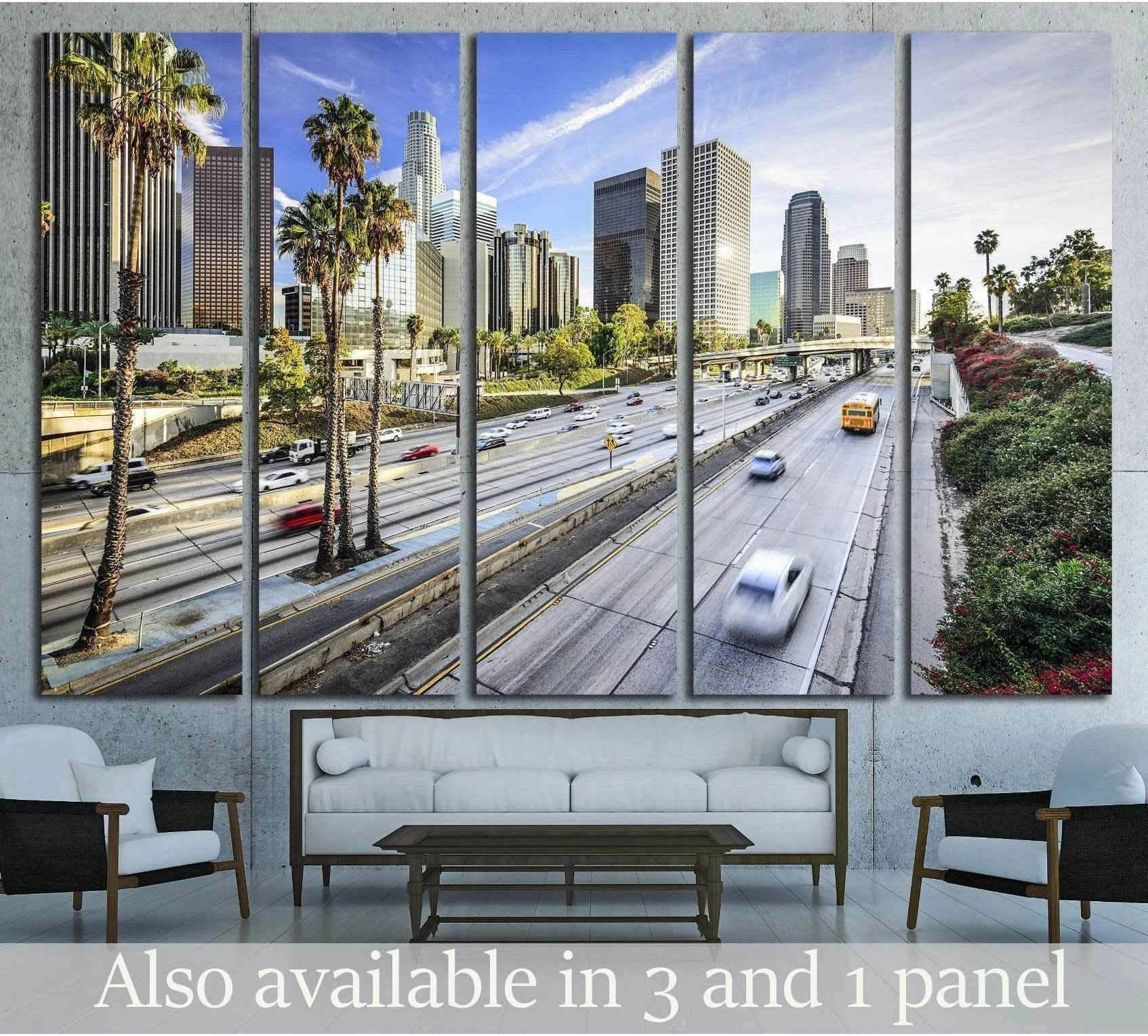 Los Angeles skyline canvas print with downtown towers, palm trees, and freeway in a modern living room