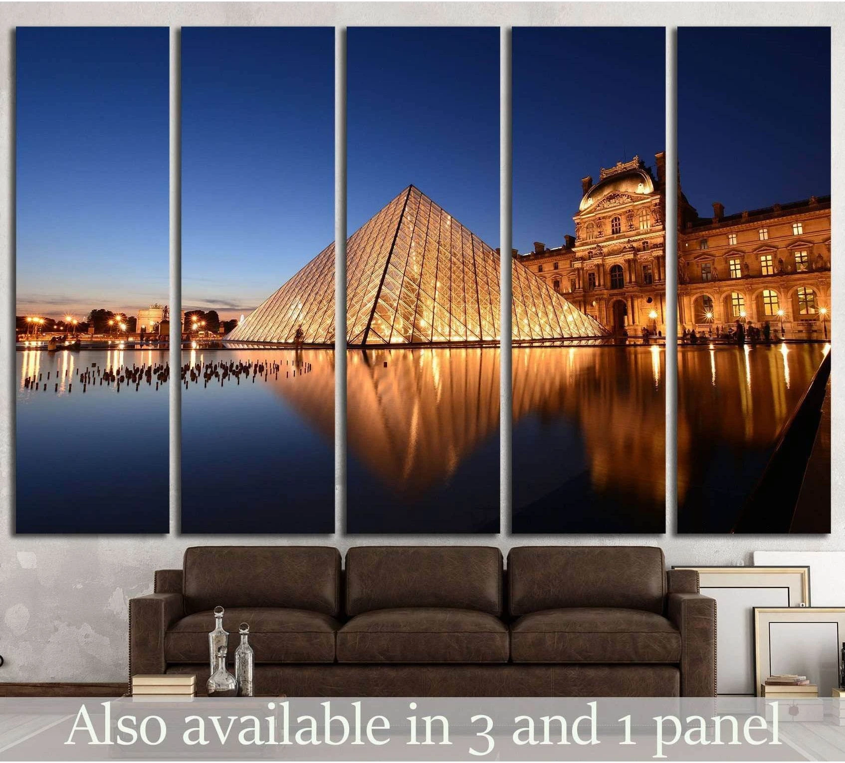 Louvre Pyramid at night canvas print reflected in water above sofa in a modern living room