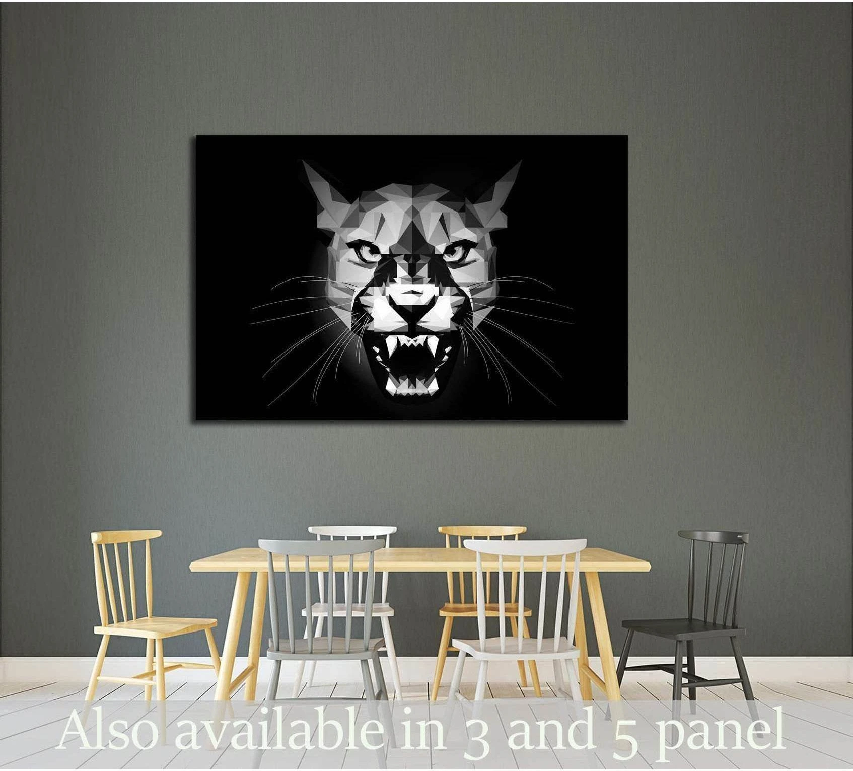 Black and white low poly puma canvas print with roaring geometric wildcat portrait above dining table