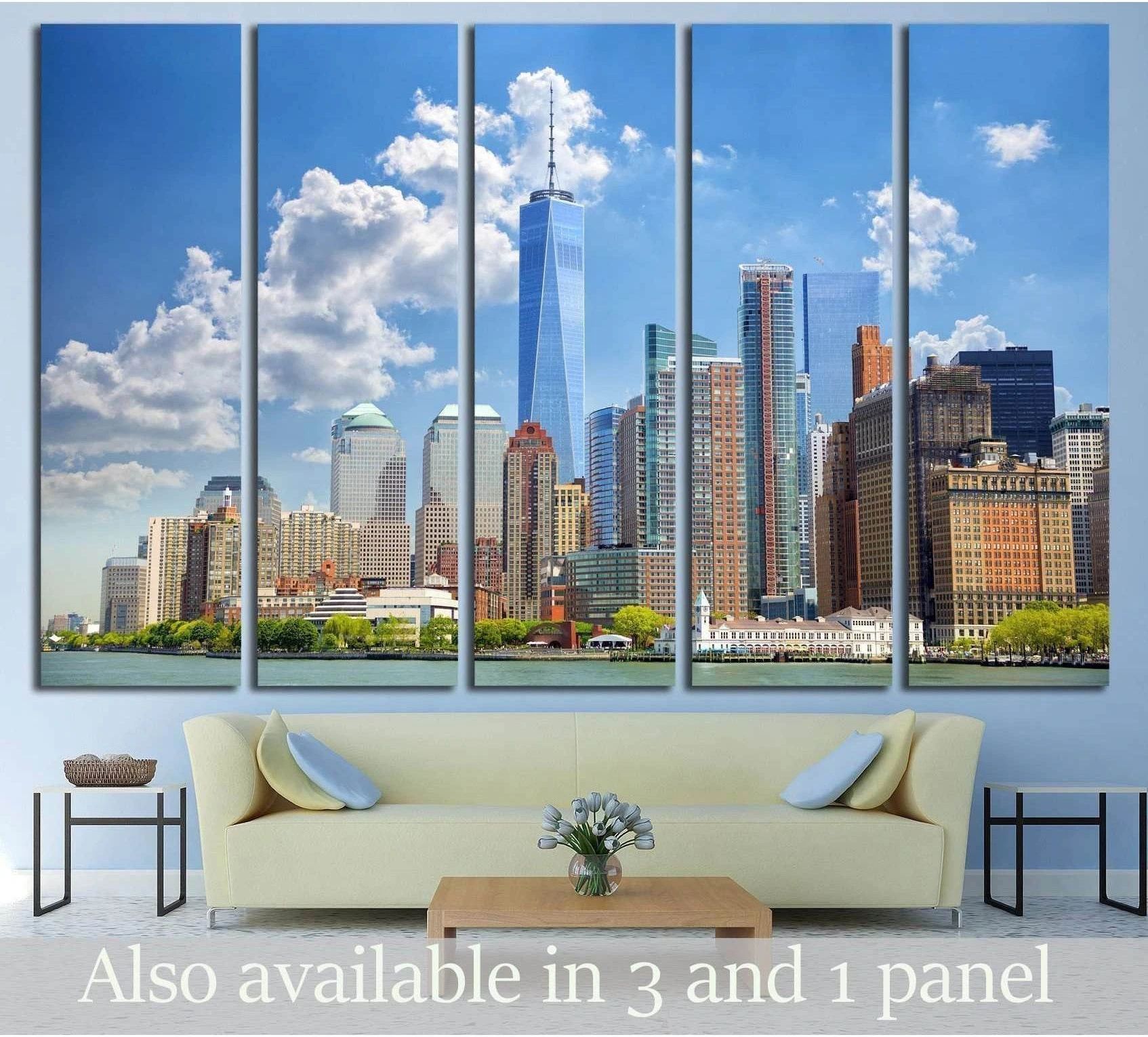 Lower Manhattan skyline canvas print with One World Trade Center above a sofa in a modern living room