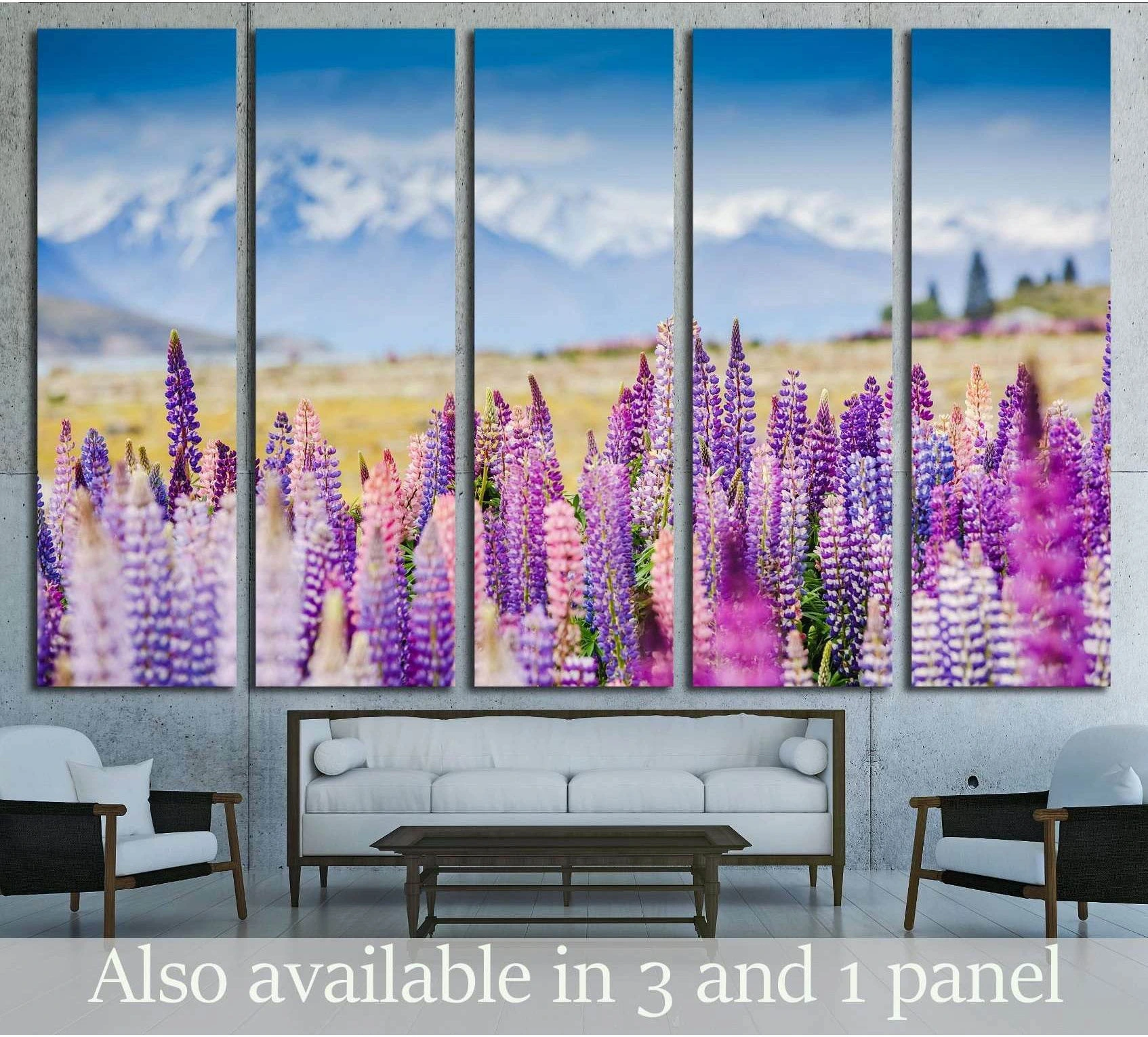 Lake Tekapo lupins canvas print with purple wildflowers, snowy mountains, and blue sky above a sofa