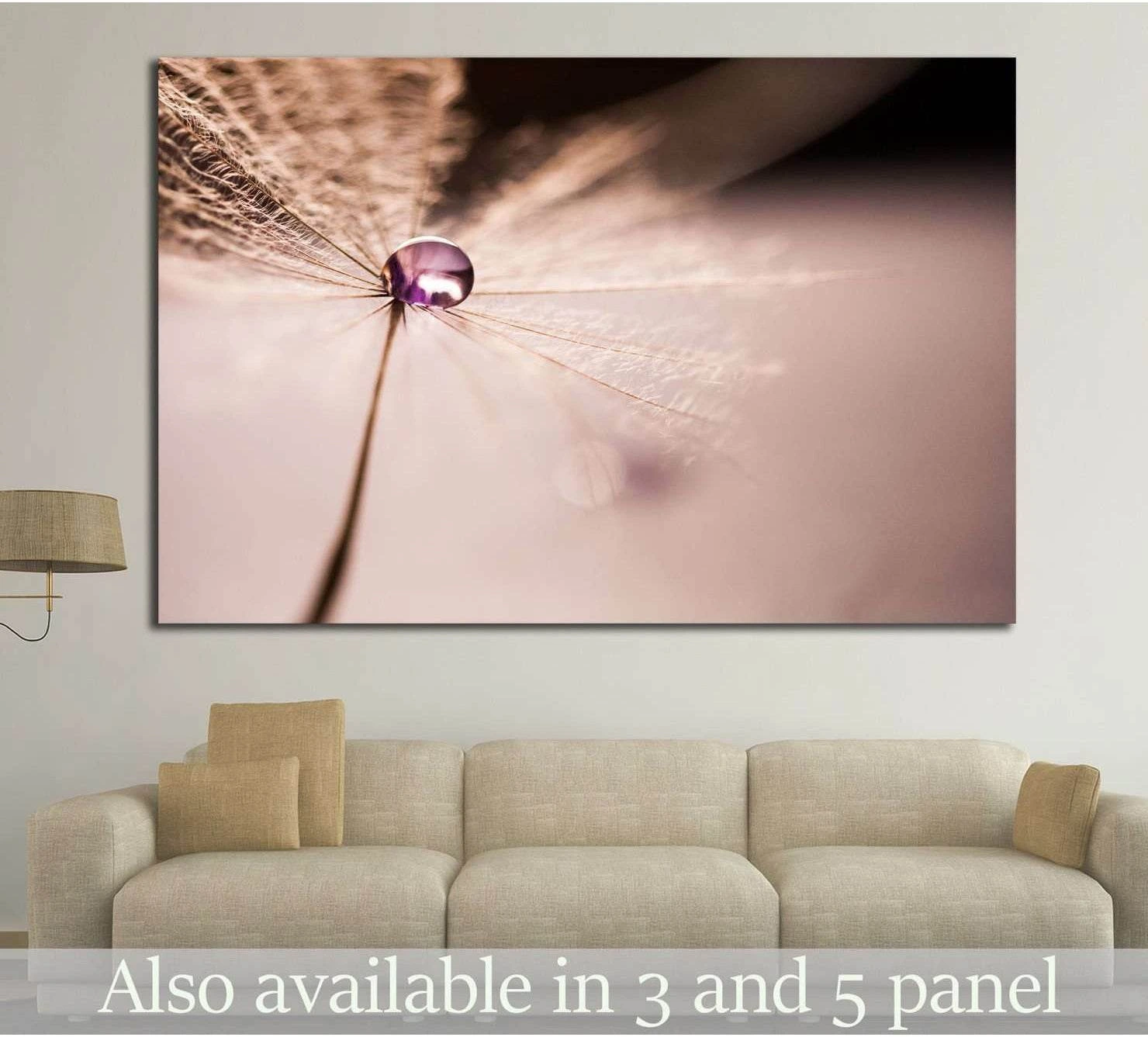 Macro dandelion seed canvas print with a purple droplet on a soft blush pink background above a sofa