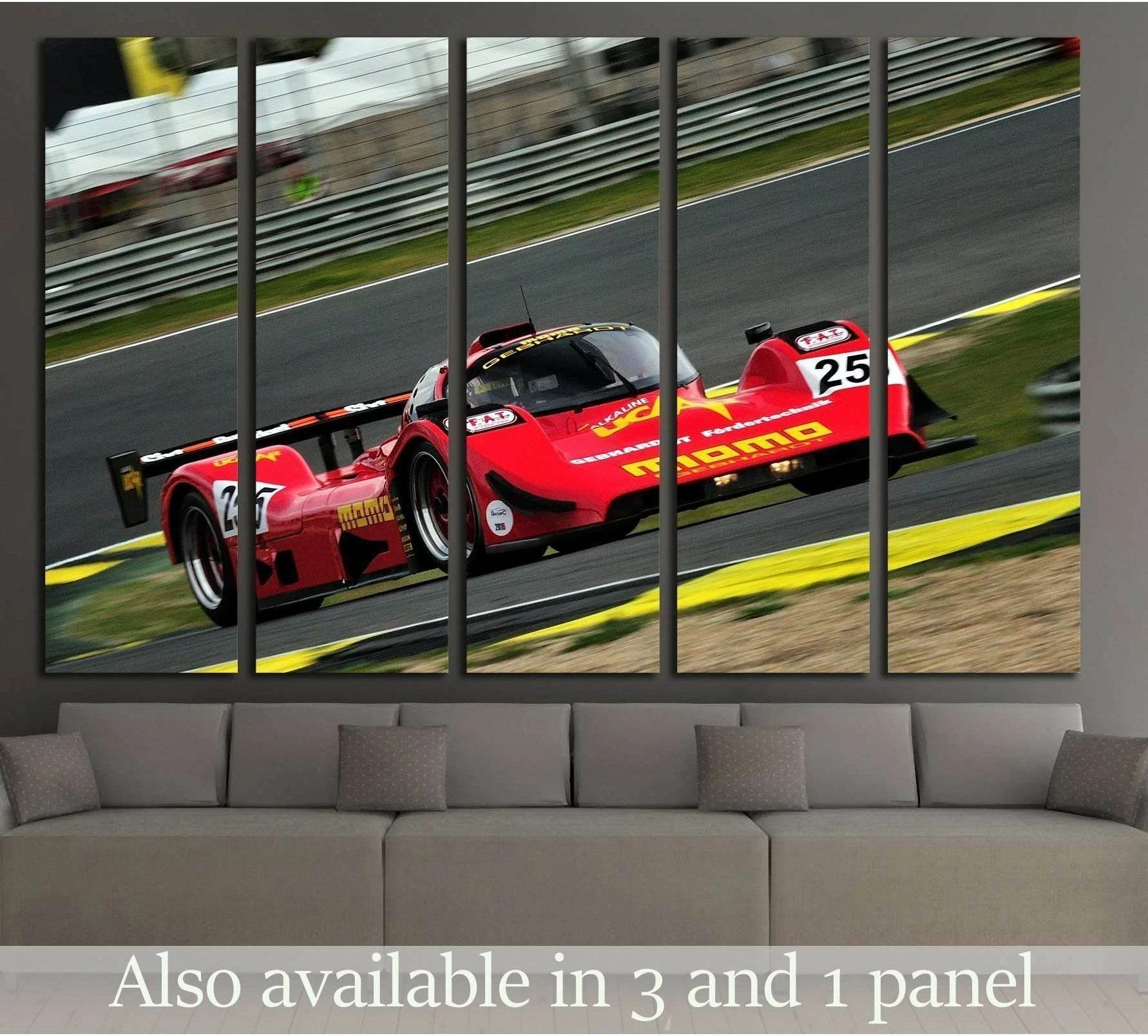 Red vintage race car canvas print speeding on a racetrack, shown as multi-panel wall art above a sofa