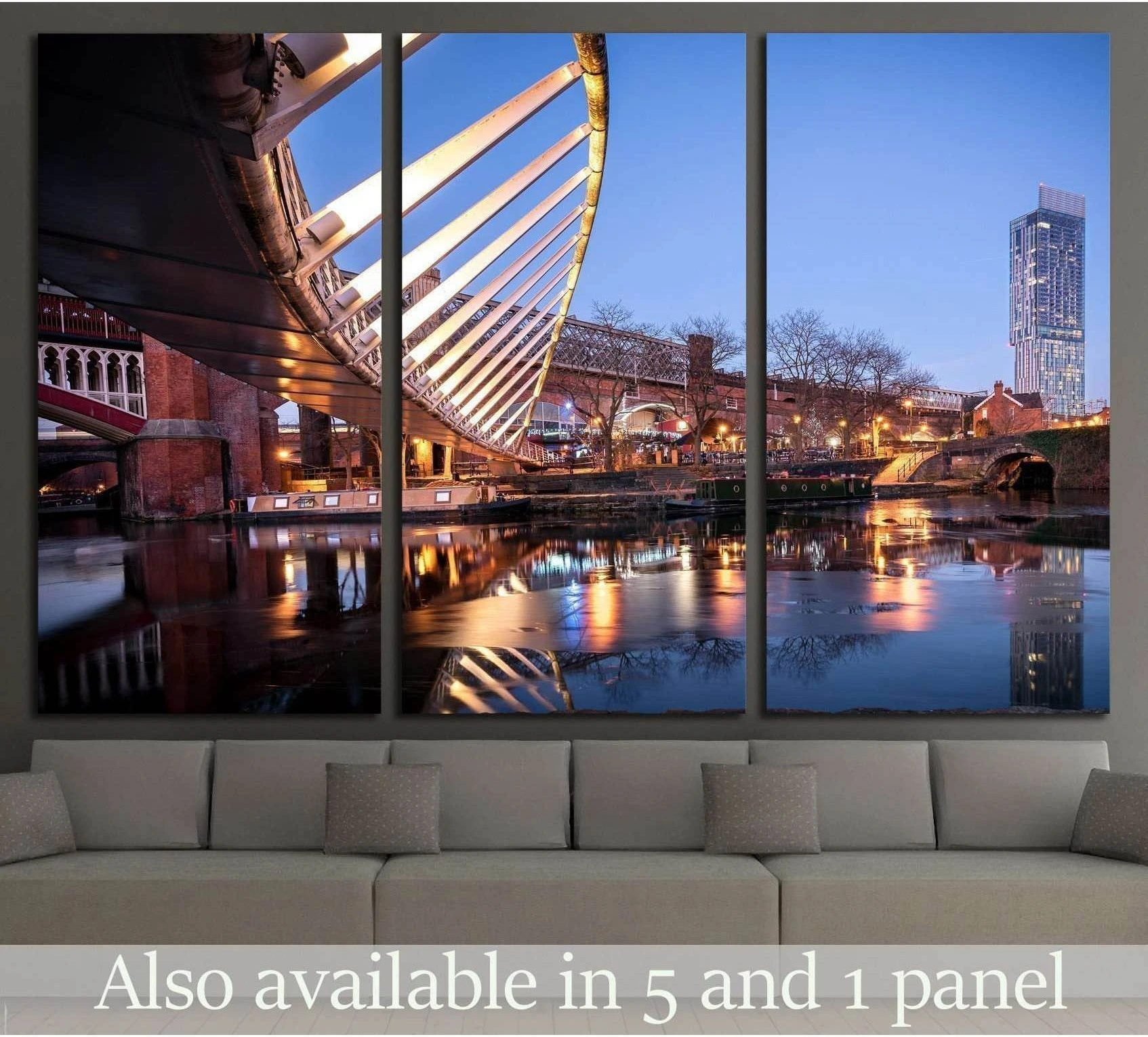 Manchester River Irwell skyline canvas print with illuminated bridge reflections above a sofa