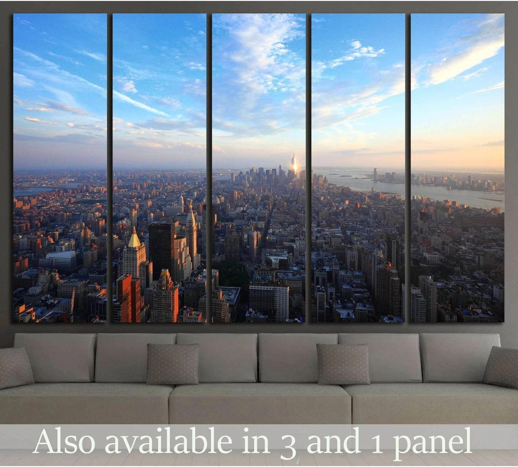 Manhattan sunset canvas print with panoramic NYC skyline above a sofa in a modern living room