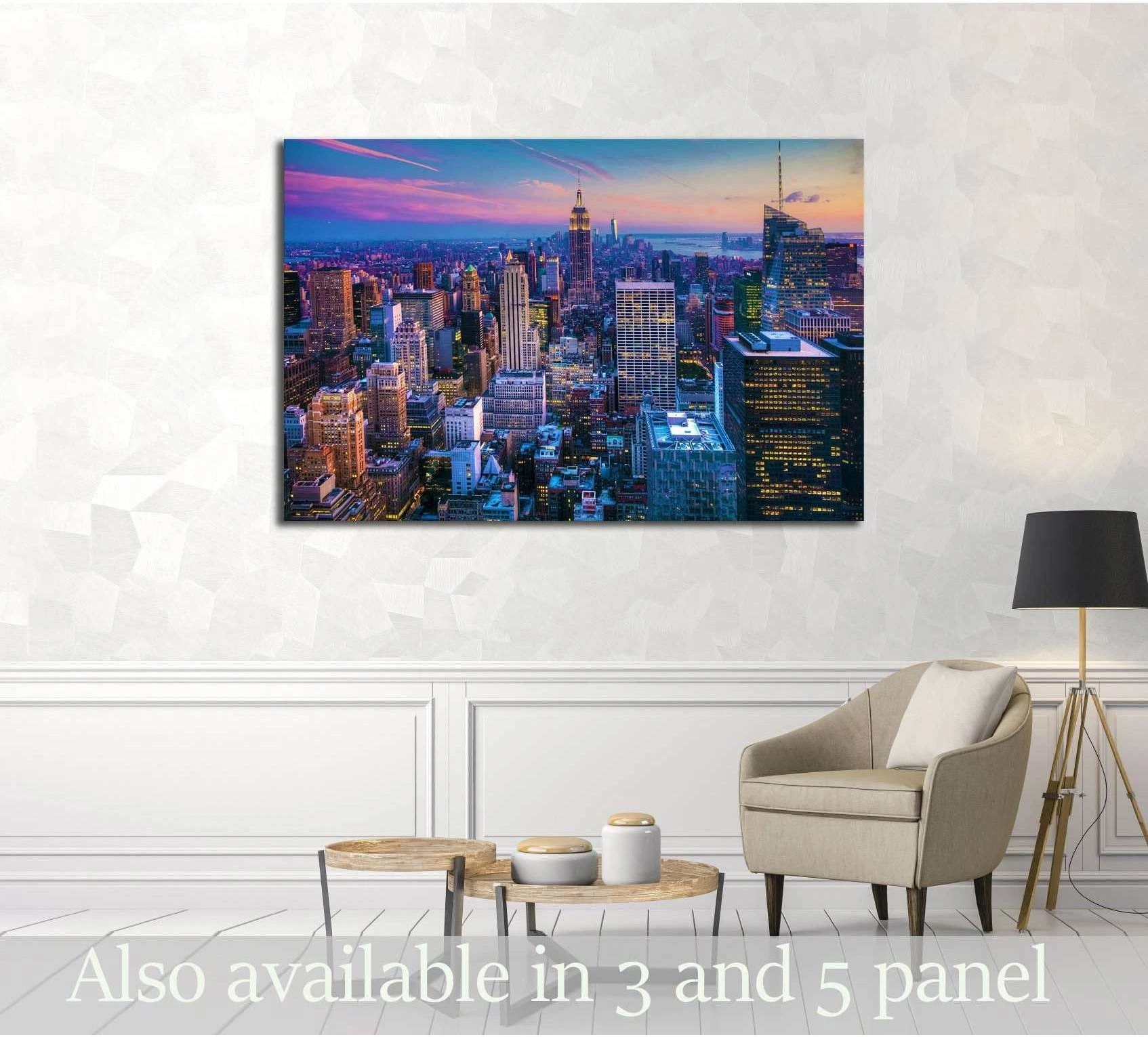 Manhattan skyline canvas print at dusk hung in a modern living room with pink and blue city lights
