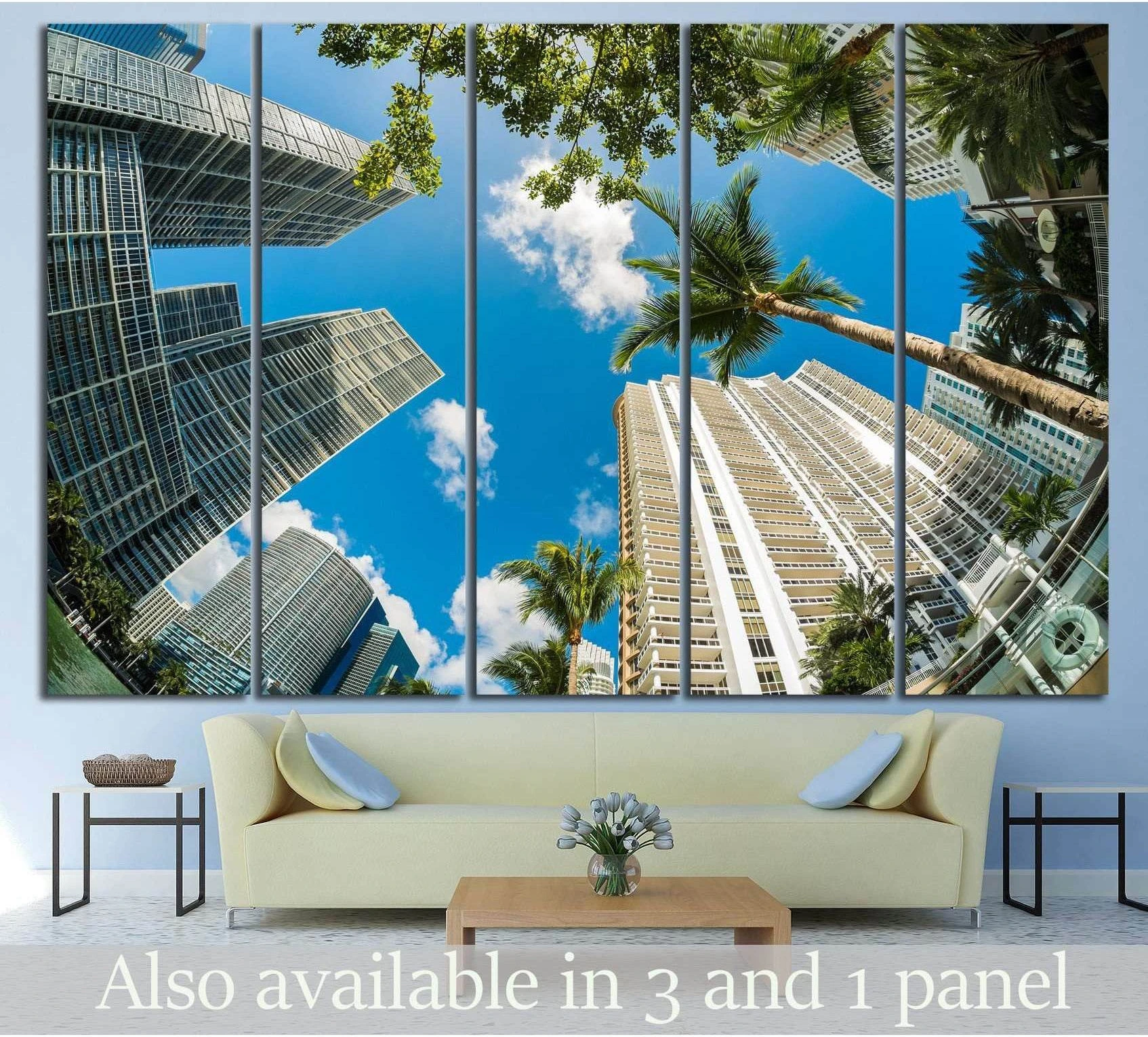 Miami skyline canvas print with palm trees and skyscrapers above a sofa in a modern living room