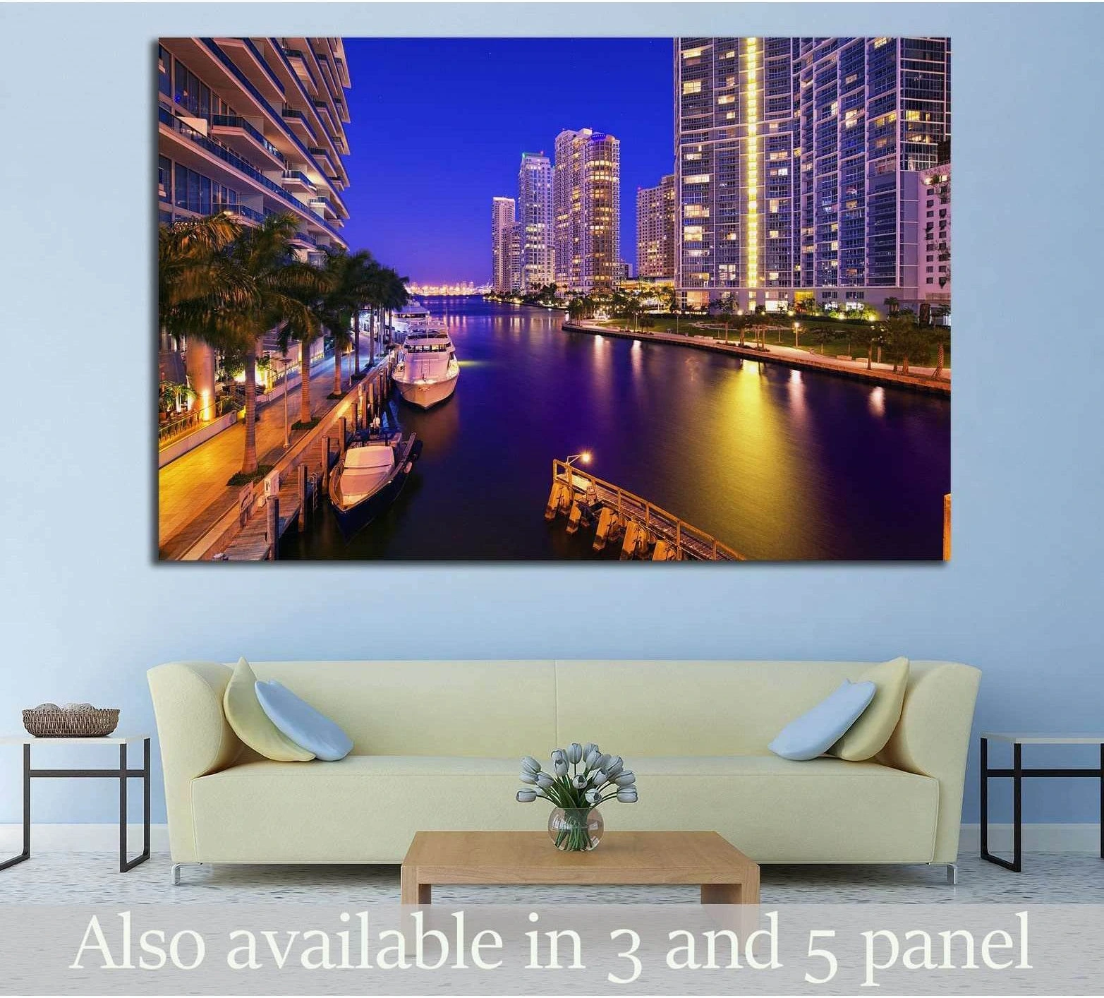 Miami night skyline canvas print with waterfront towers, yachts, and canal reflections above a sofa