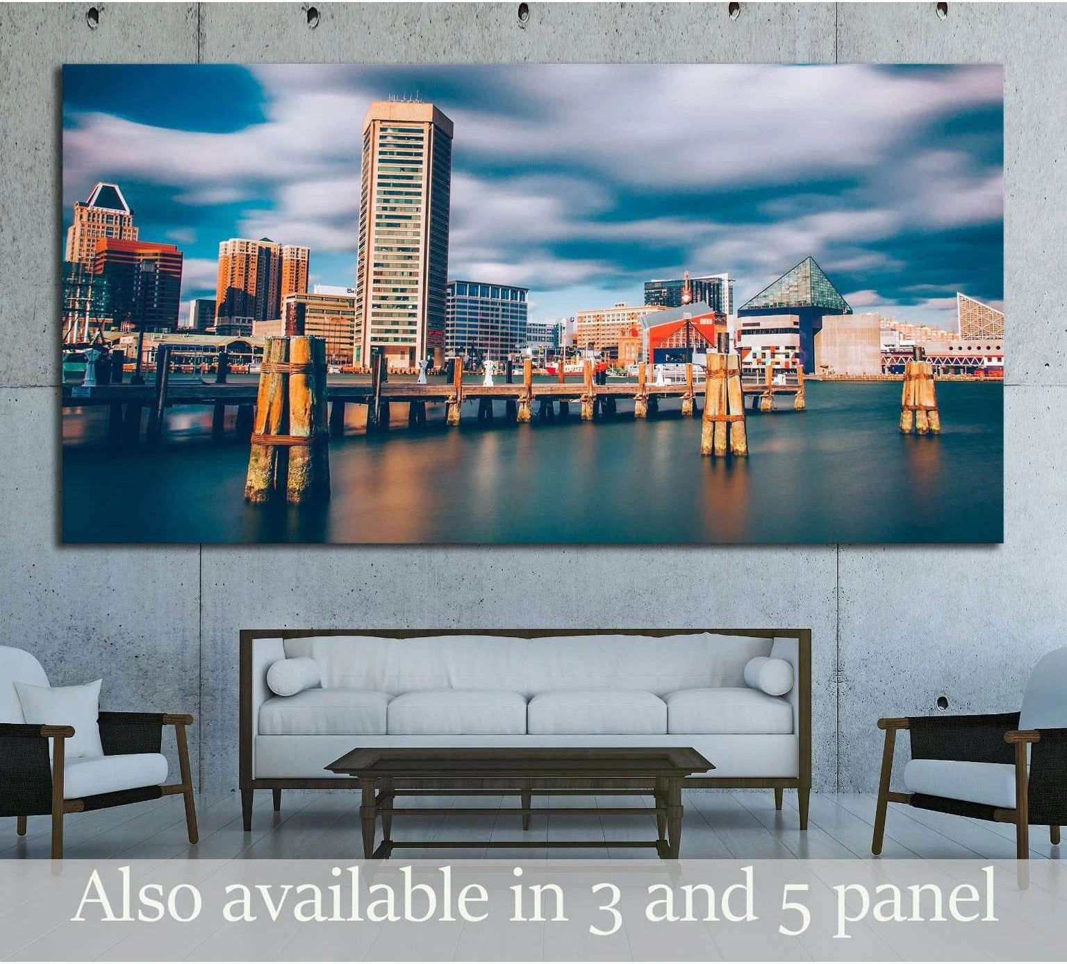 Baltimore Inner Harbor skyline canvas print above sofa with blue water, harbor posts, and waterfront buildings