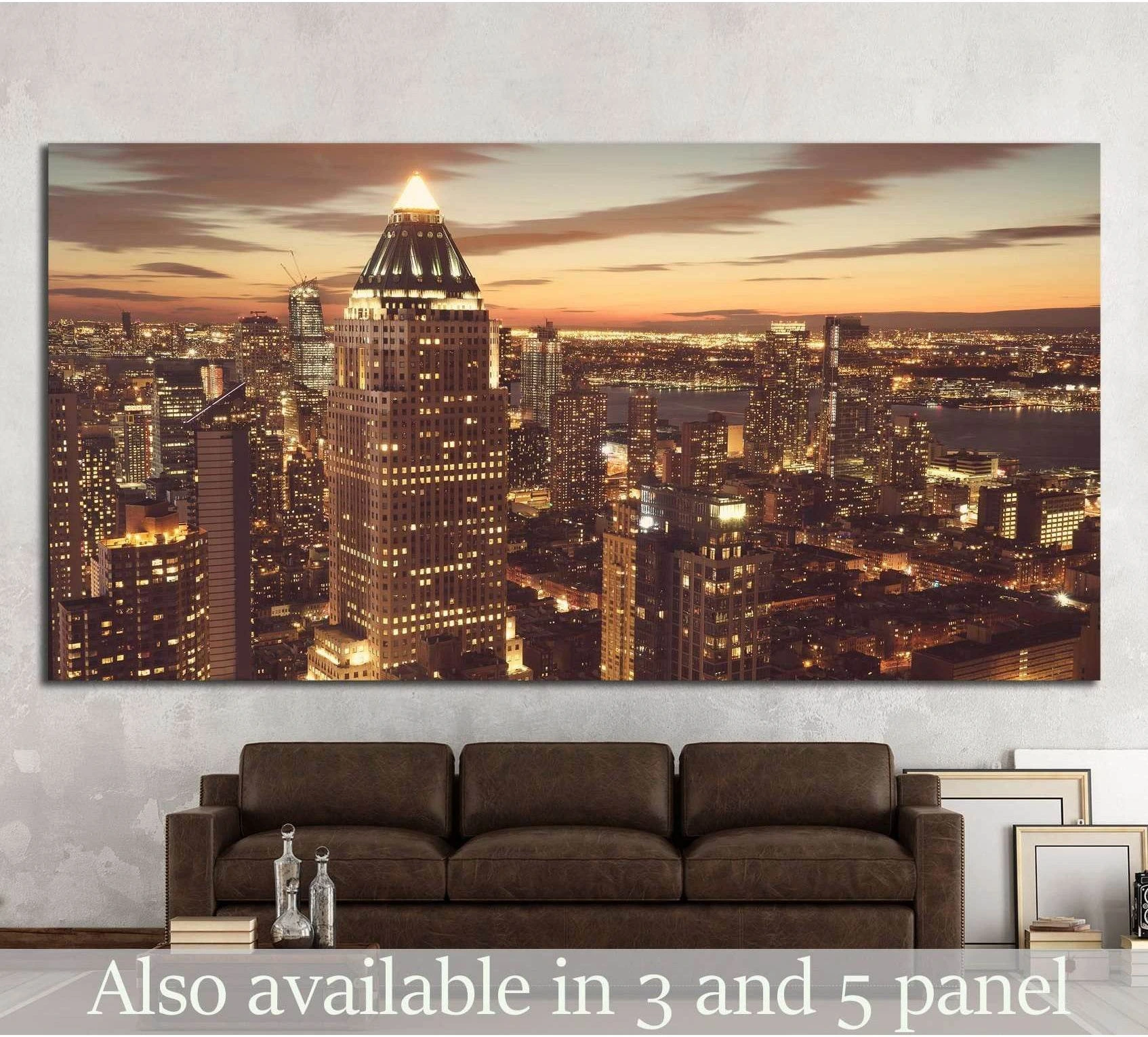 Midtown Manhattan skyline canvas print at sunset above a sofa in a modern living room