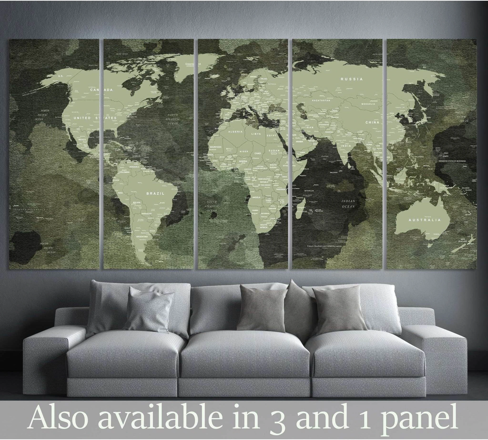 Five-panel military world map canvas print above a gray sofa in a dark modern living room