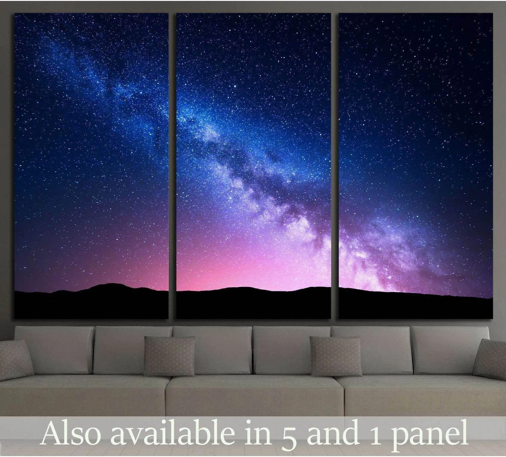 Milky Way canvas print over dark mountain silhouettes in blue and pink night sky