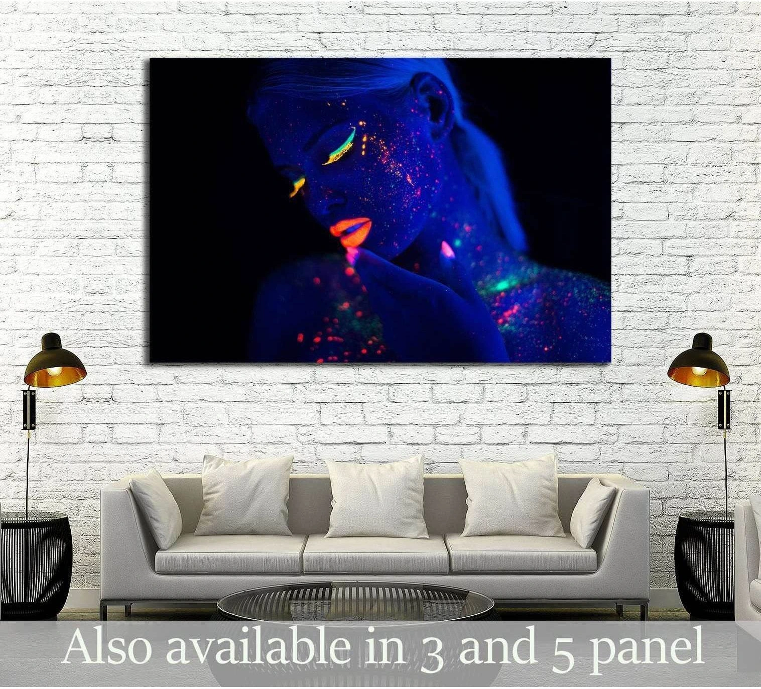 Fluorescent makeup model canvas print with neon blue portrait above sofa in modern living room
