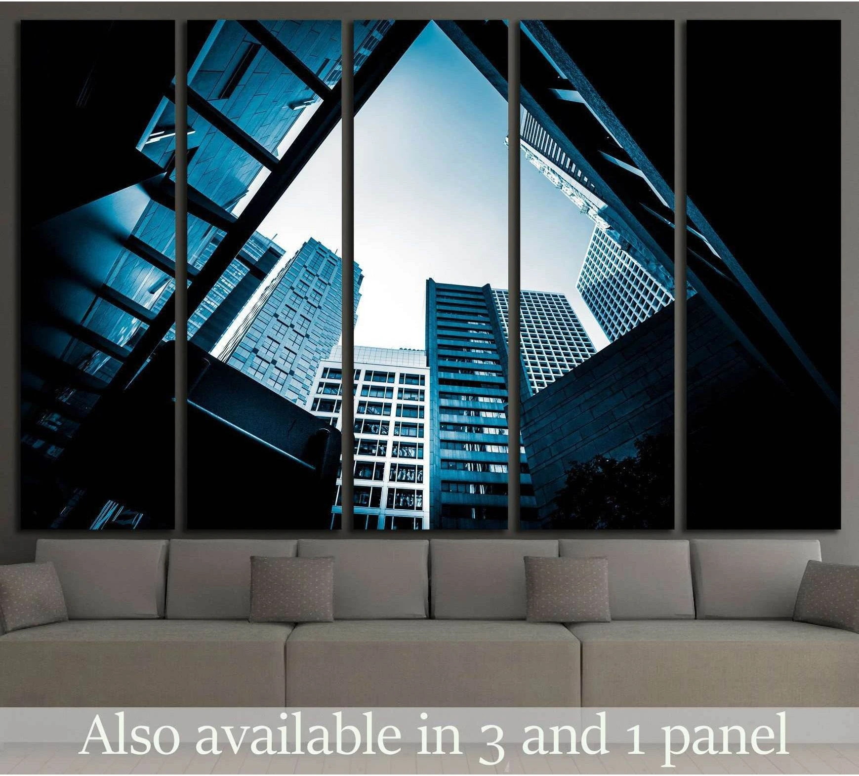 Blue monochrome modern architecture canvas print with upward skyscraper view in a five-panel office mockup