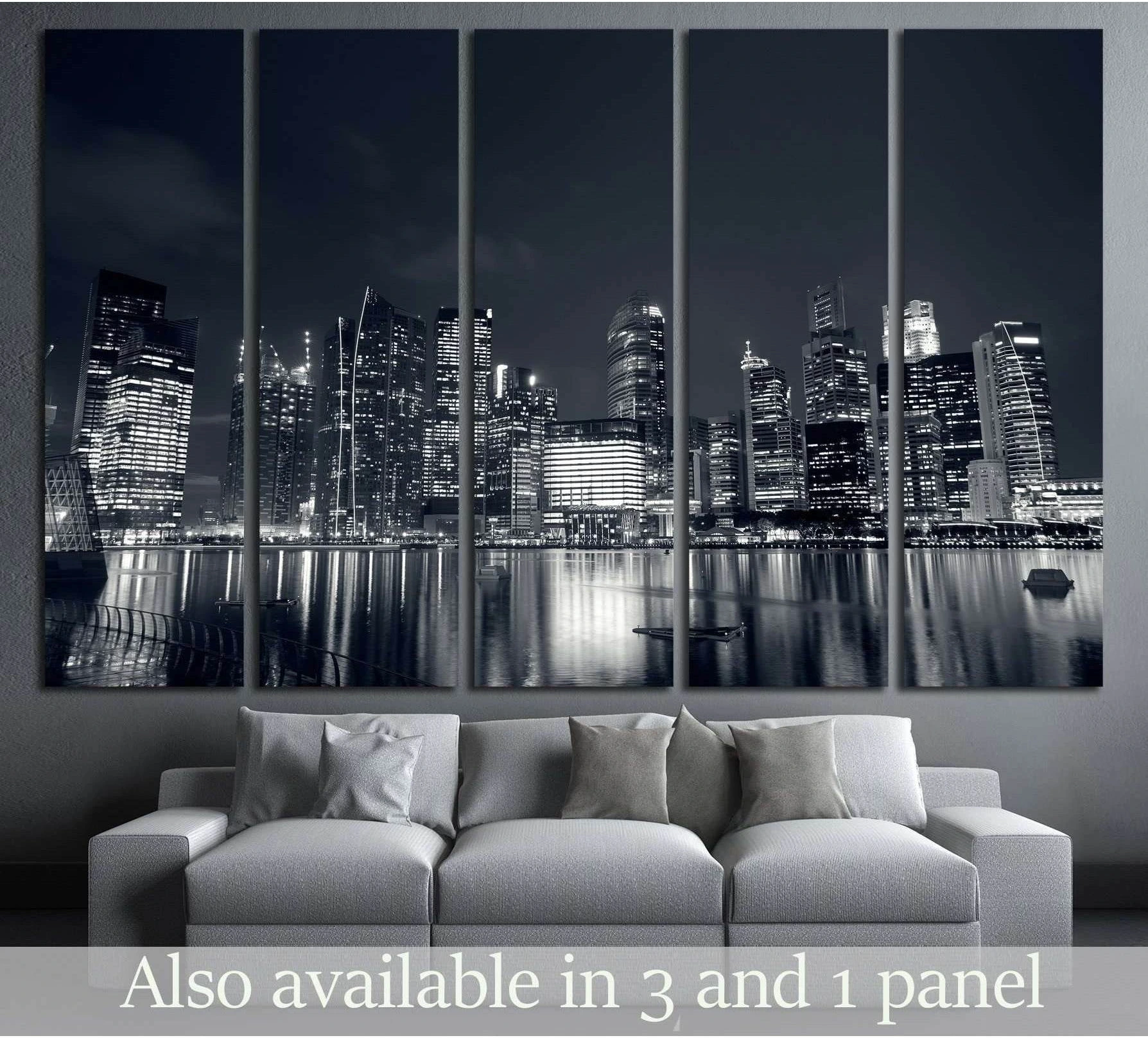 Black and white Singapore skyline canvas print above a sofa in a modern living room