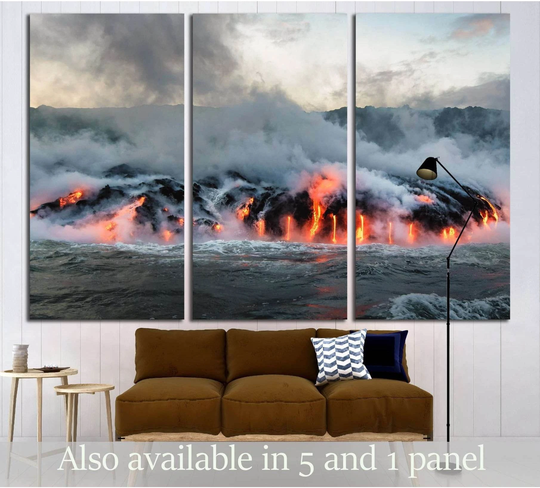 Big Island Hawaii lava canvas print with molten lava flowing into the Pacific, shown as triptych above a sofa