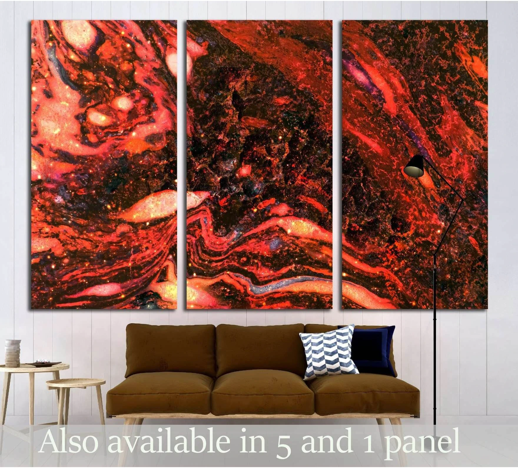Molten lava abstract triptych canvas print in red and black above a sofa in a modern living room