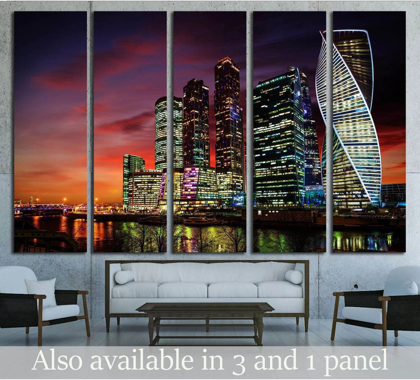 Moscow City skyline canvas print at night above sofa in a modern living room