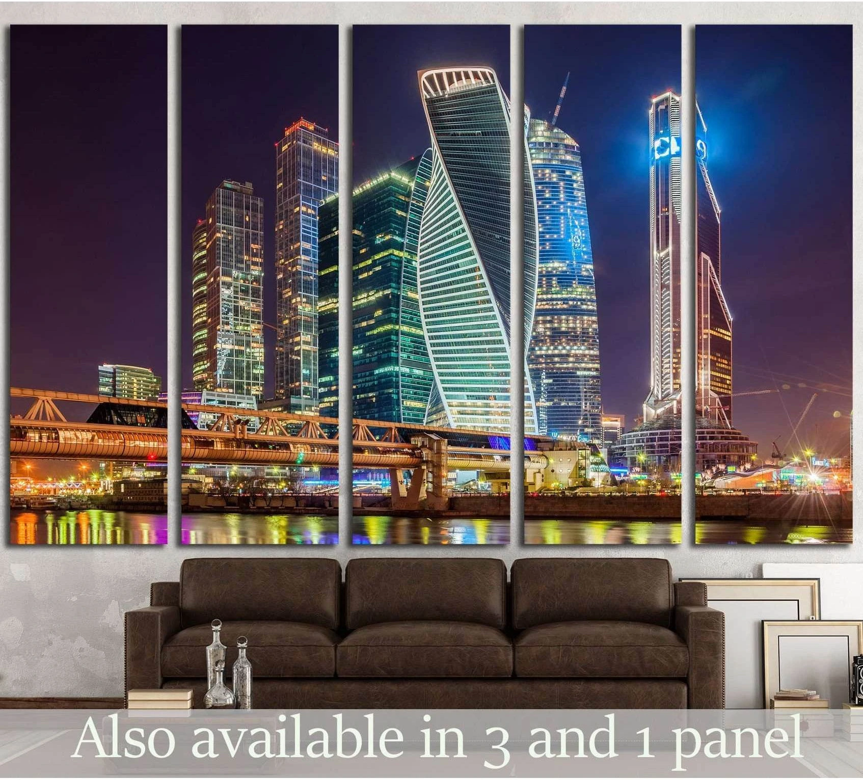 Moscow City skyscrapers at night canvas print above sofa in a modern living room