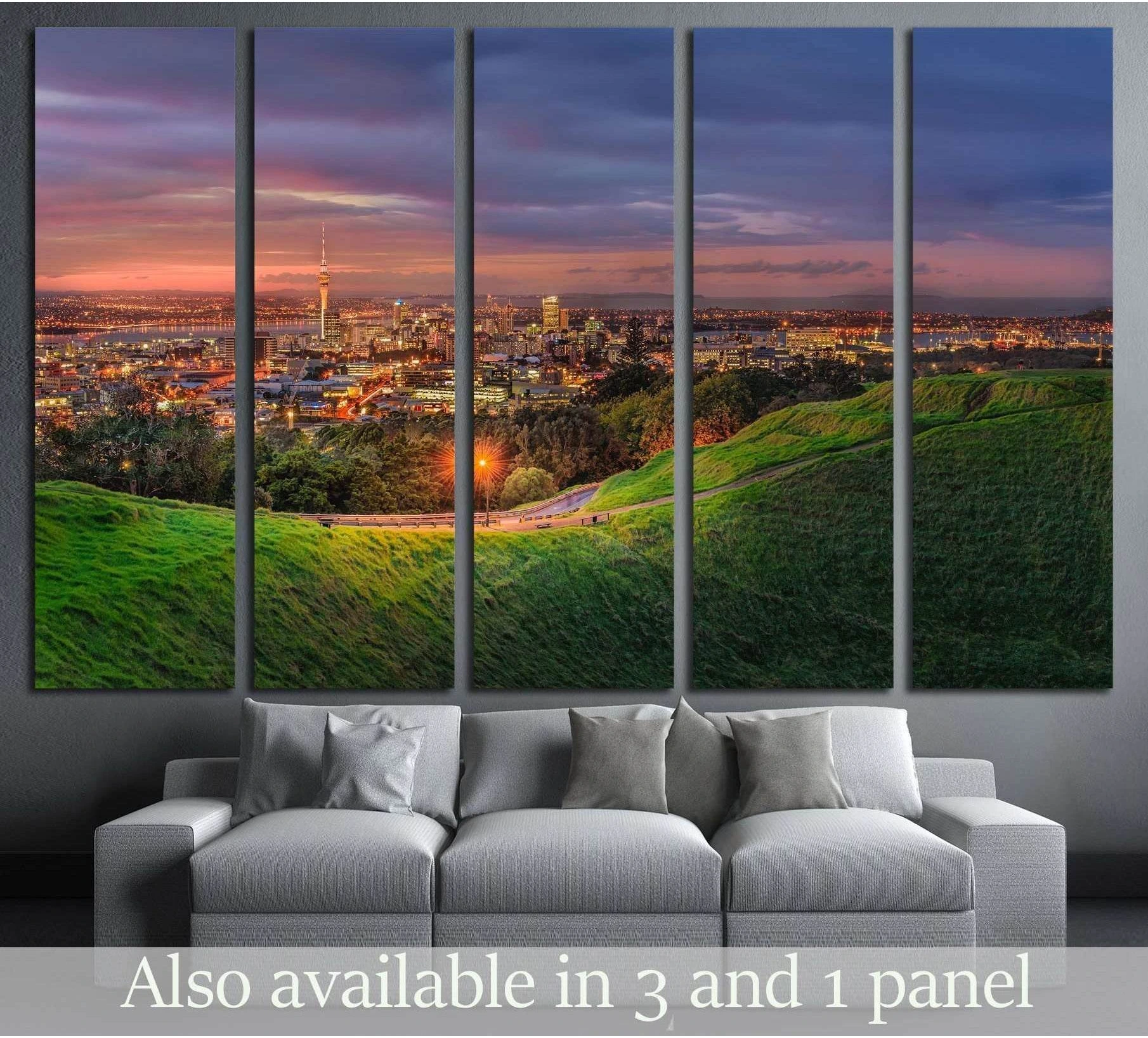 Auckland skyline canvas print from Mount Eden at dusk displayed above a sofa in a modern living room