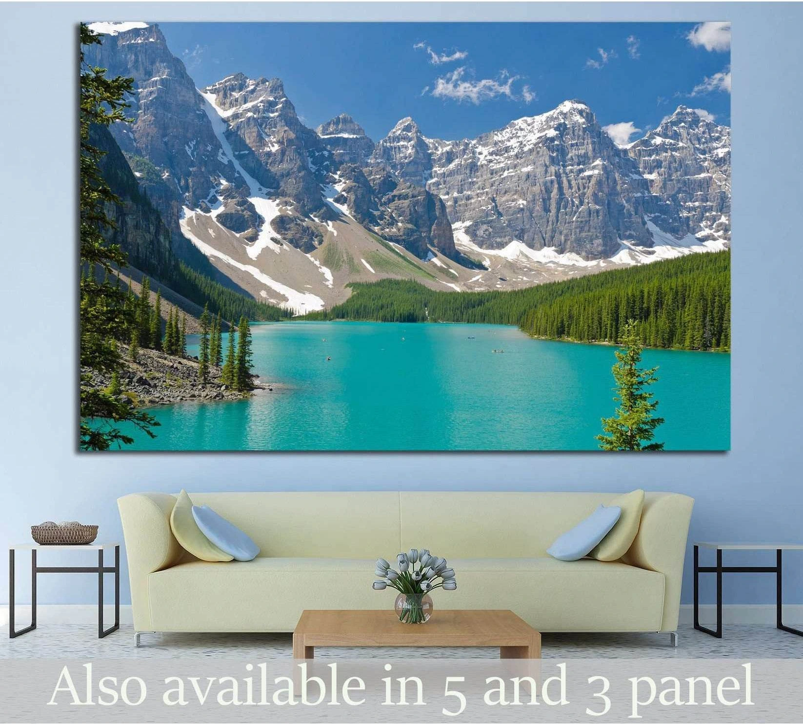 Canadian mountain lake canvas print with turquoise water and snow-capped Rockies above a sofa