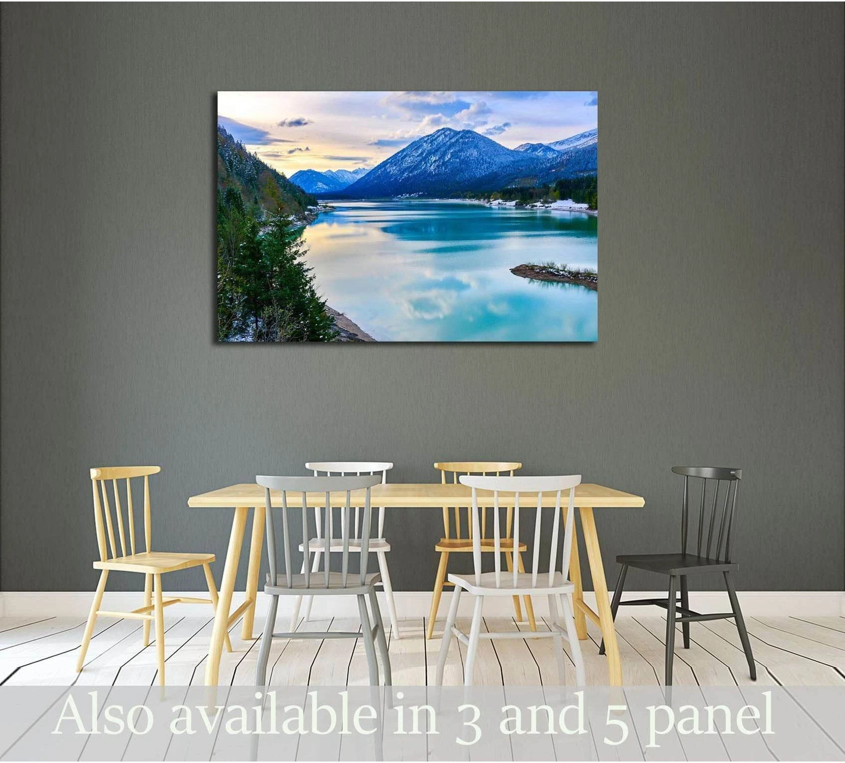 Mountain lake canvas print with turquoise water and snow-capped peaks above a dining table