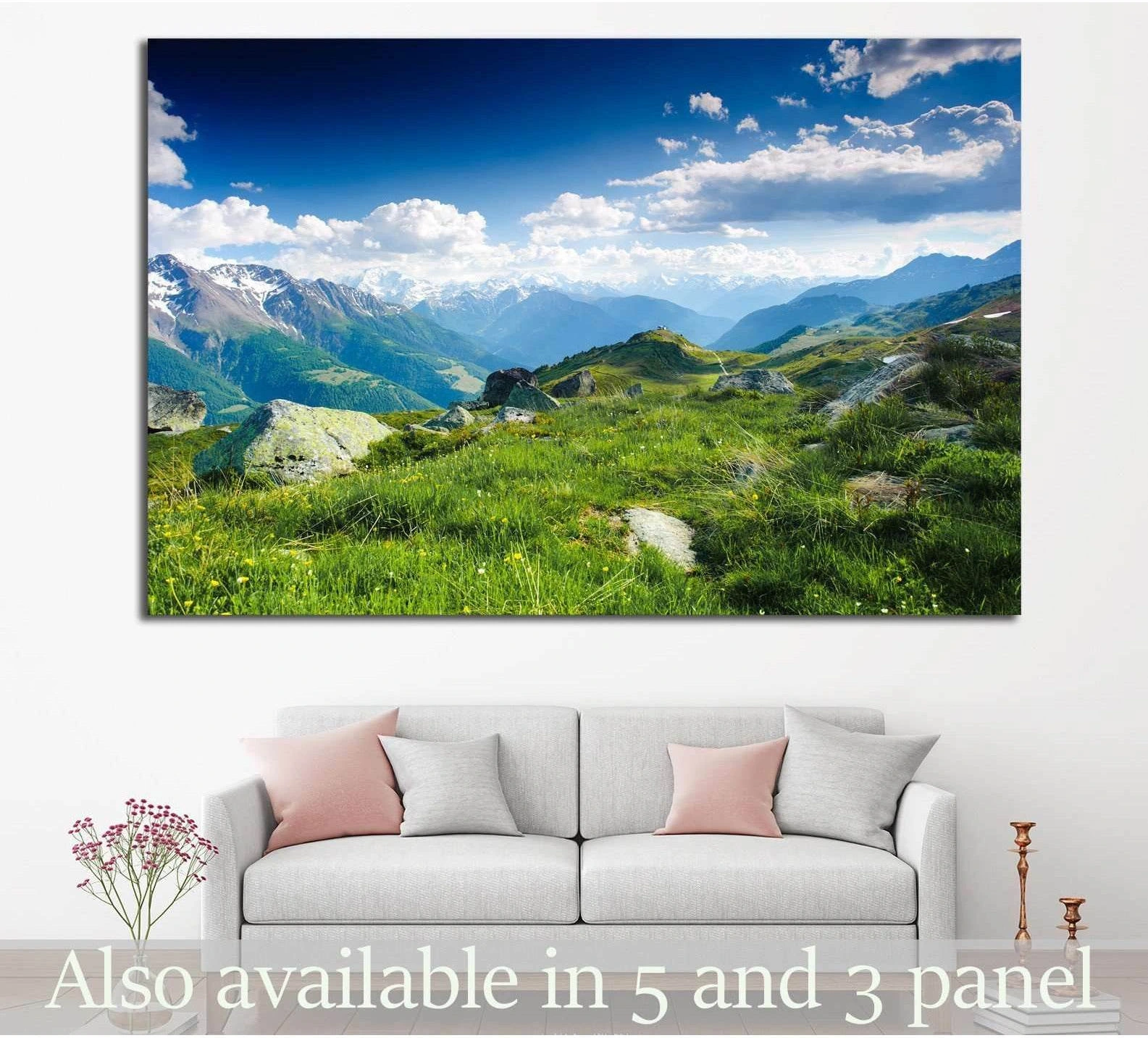Swiss Alps mountain canvas print with green alpine meadow above sofa in a modern living room
