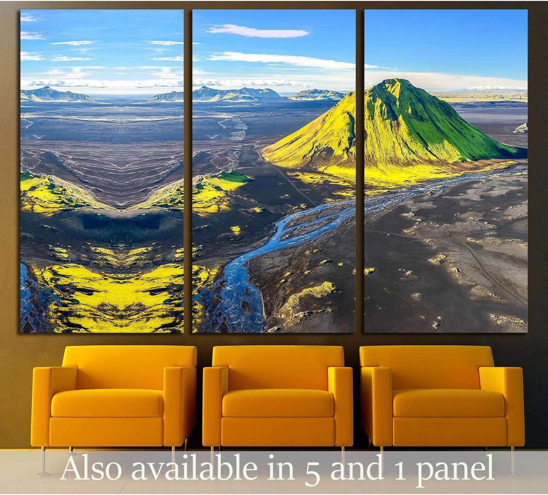 Triptych green mountain canvas print with winding blue river above chairs in a modern waiting room