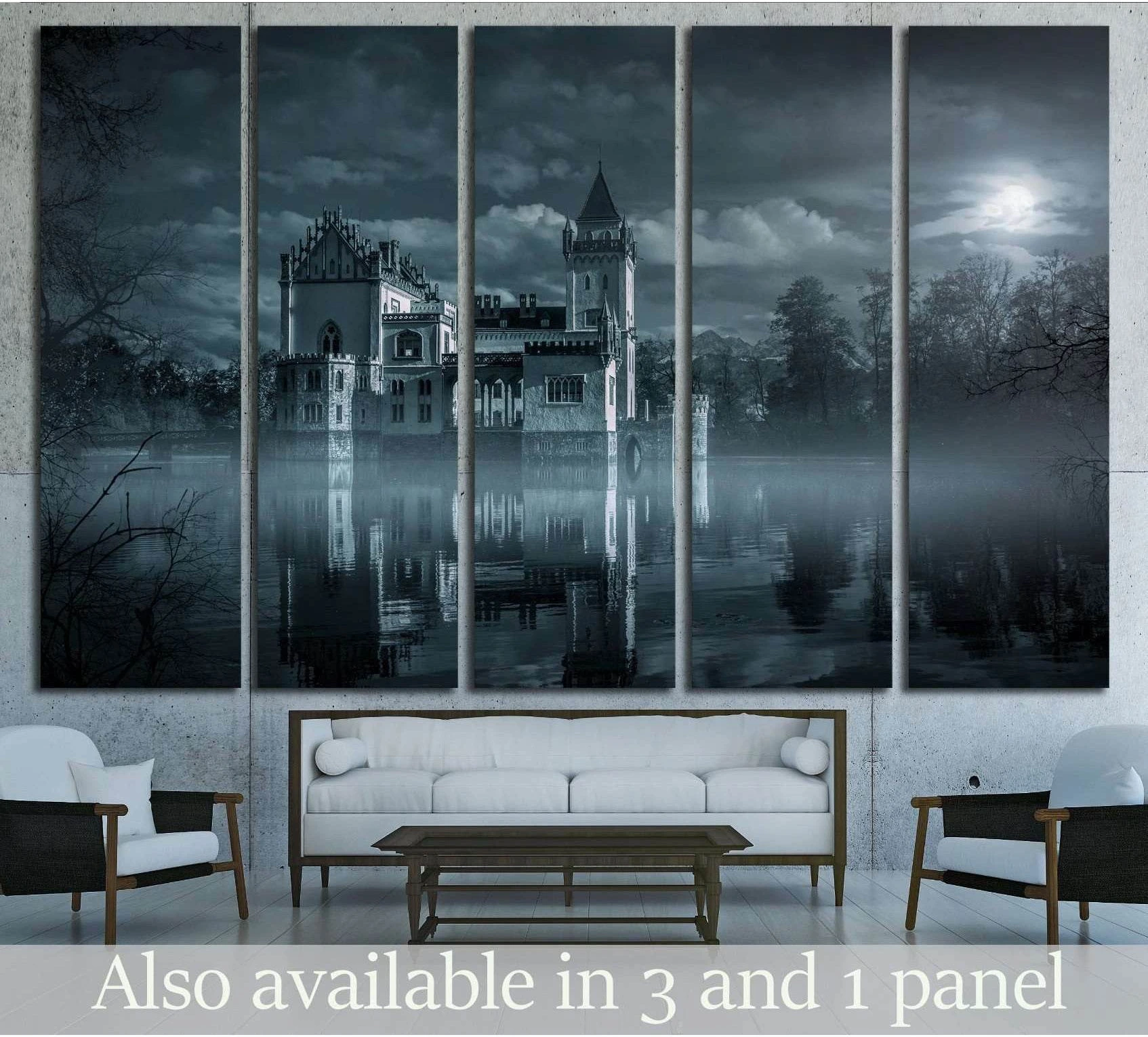 Moonlit castle canvas print above sofa with gothic lakeside castle, misty water, and full moon