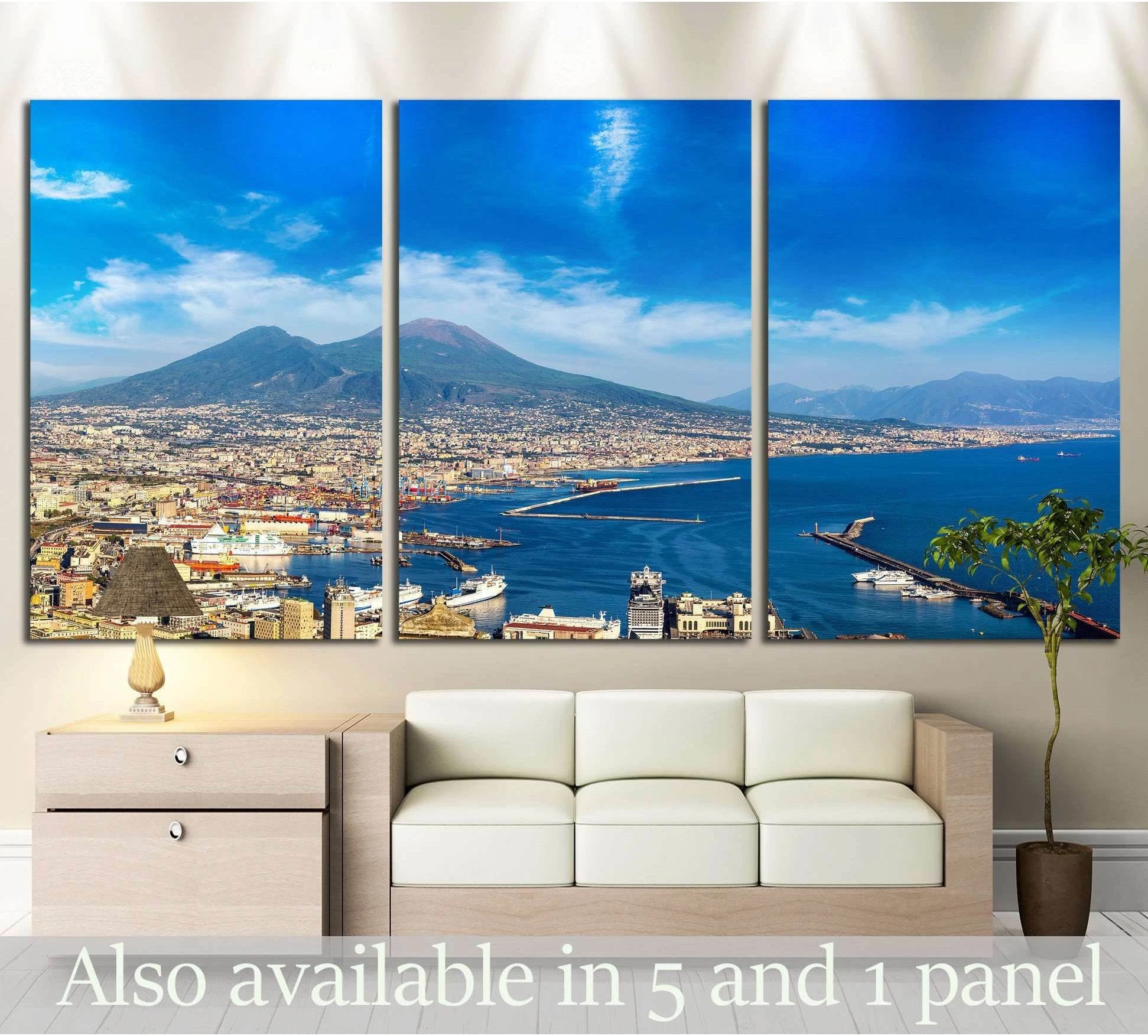 Naples harbor and Mount Vesuvius triptych canvas print above sofa in a modern living room