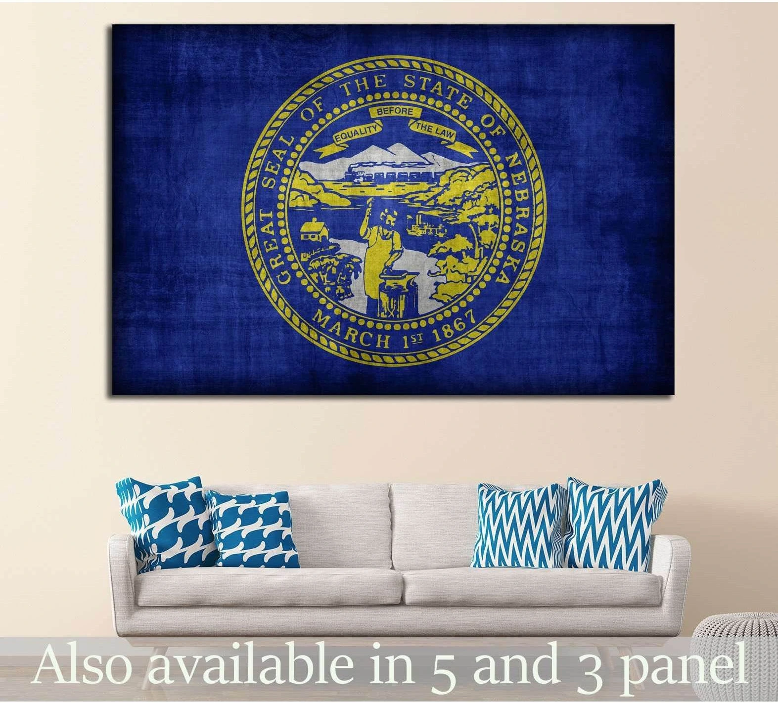 Nebraska state flag canvas print with gold seal above sofa in a neutral living room