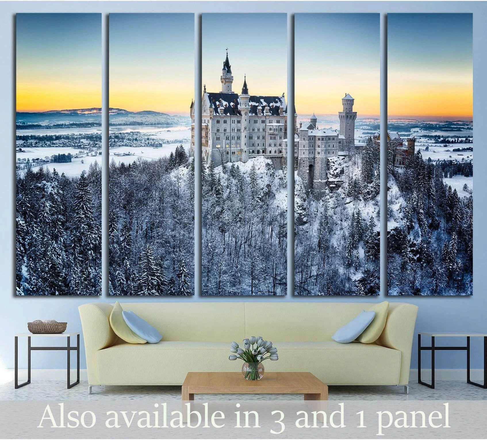 Neuschwanstein Castle canvas print in a snowy Bavarian sunset landscape above a modern sofa