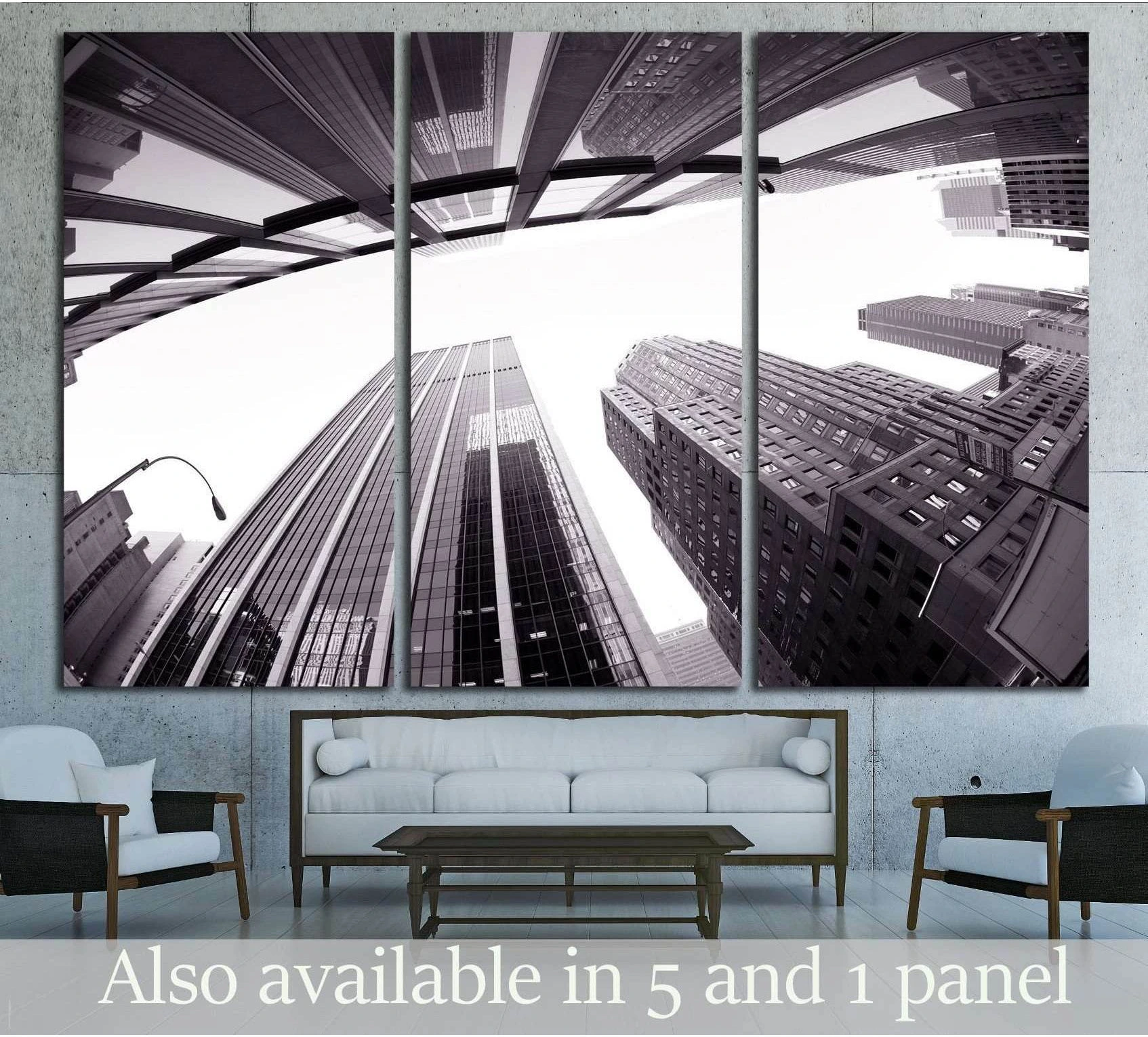Black and white NYC skyscraper canvas print with upward street view above sofa in modern living room